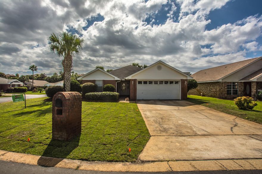 SHORT TERM RENTALS ALLOWED! Walk to the deeded access beach only 1 block away or the beautiful, private, community pool.Great family neighborhood. 4 bedrooms, split floor plan. Spacious living area with lots of windows. Private Master suite with double vanities, garden tub & separate shower. Private, fenced backyard. New air conditioner & 2 year old roof!