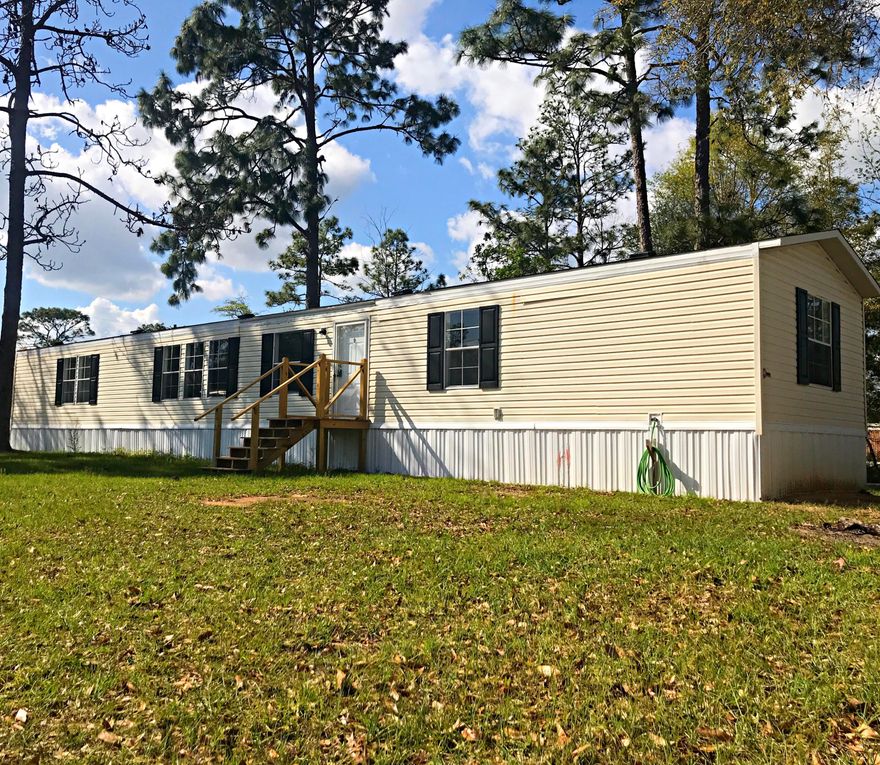 Nice 3 bedroom 2 bath Manufactured Home New paint, New carpet, Spacious floor plan!Central Heat and Air, Master bath has walk in shower with separate garden tub, Located on a Corner Lot in the Kings Lake Area. Buy this home for your personal residence or turn it into a rental income producing property. Sellers will pay $3,000.00towards buyers closing cost with full price offer.