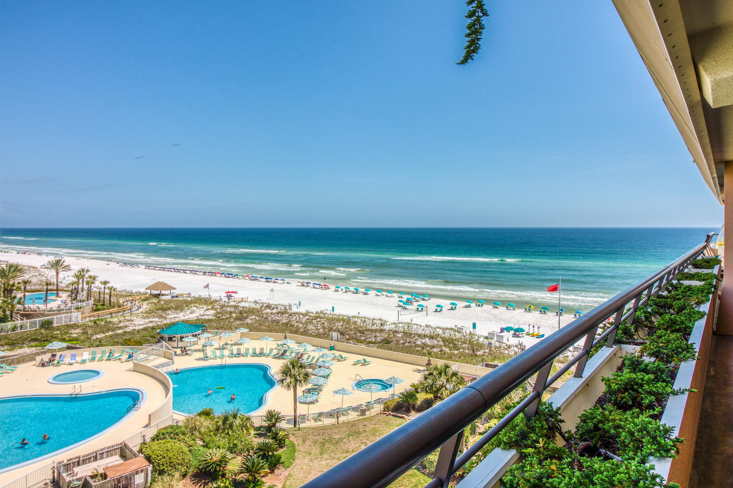 Don't just look at the beach, look down the beach, from this premium location at Edgewater Resort. Situated at the far south end of the 7th floor, you will enjoy excellent views of emerald waters and sugar white sands from both the master bedroom and living areas which are connected by the large balcony. Inside this light and bright unit, the large kitchen has solid surface counter tops, stainless appliances and bar seating. Even the additional bedroom has views looking west towards Destin. Just bring your flip flops and beach towel because this unit is being sold turn key with beautiful furniture and lots of rental bookings already in place. Edgewater is a Gulf front Resort that offers a ton of amenities. Some include a private beach, pool, gym, shuffleboard, covered parking and more