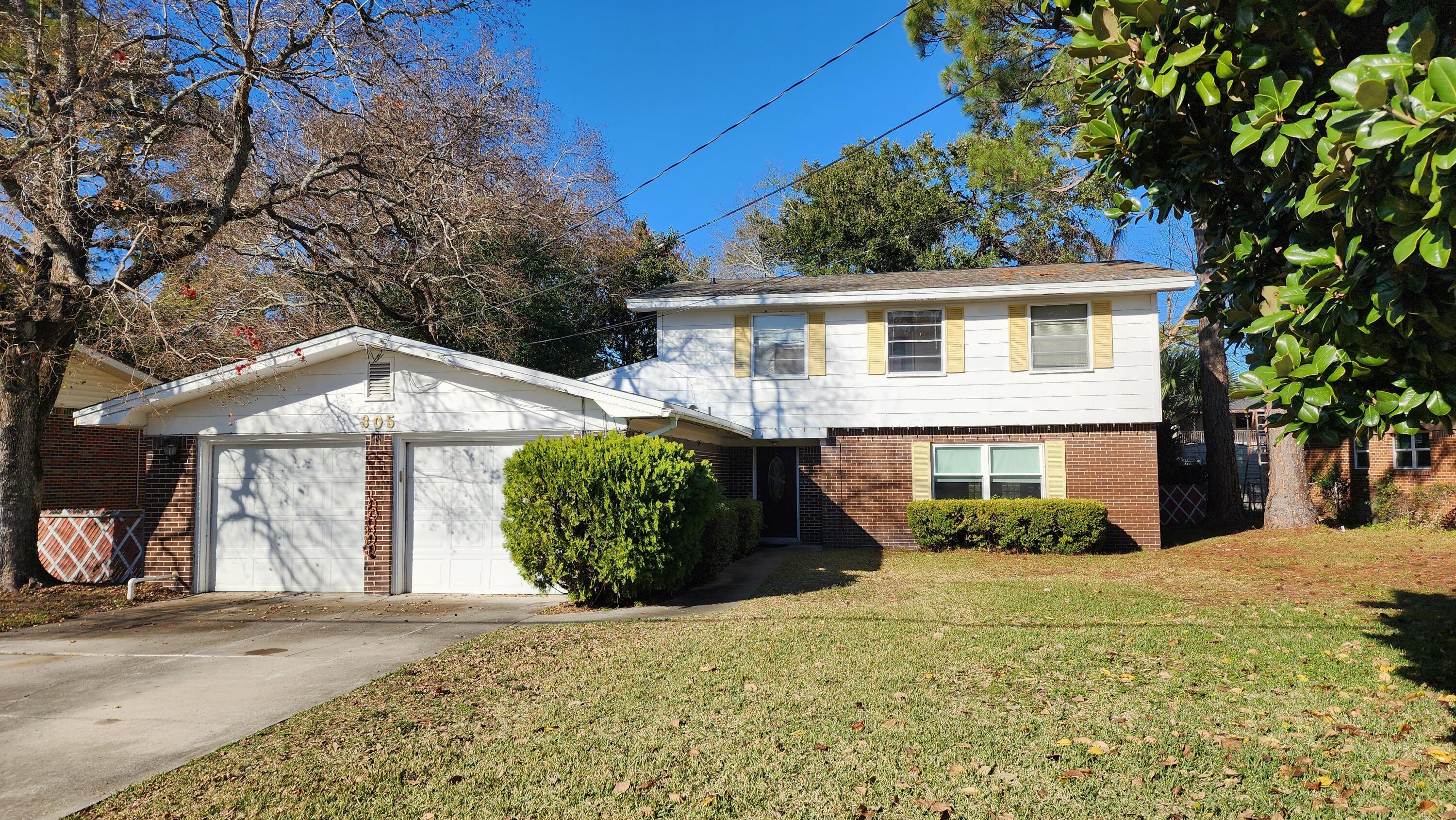 Investors Welcome! New Roof! 2,500 Sqft!! Centrally located near great schools, grocery options, restaurants, multiple parks, and not far from the beach. Large 2 car garage. Large concrete pool. Perfect opportunity for an investor or motivated owner. A lot of room to work with. Flooring is a mix of original hard wood, LVP and luxury tile. Updated windows in main living areas. There is also plenty of room to convert the room with the floor to ceiling built in bookshelves into a downstairs master bedroom suite. You won't want to miss this opportunity!! HVAC 2021, W.H. 2013.