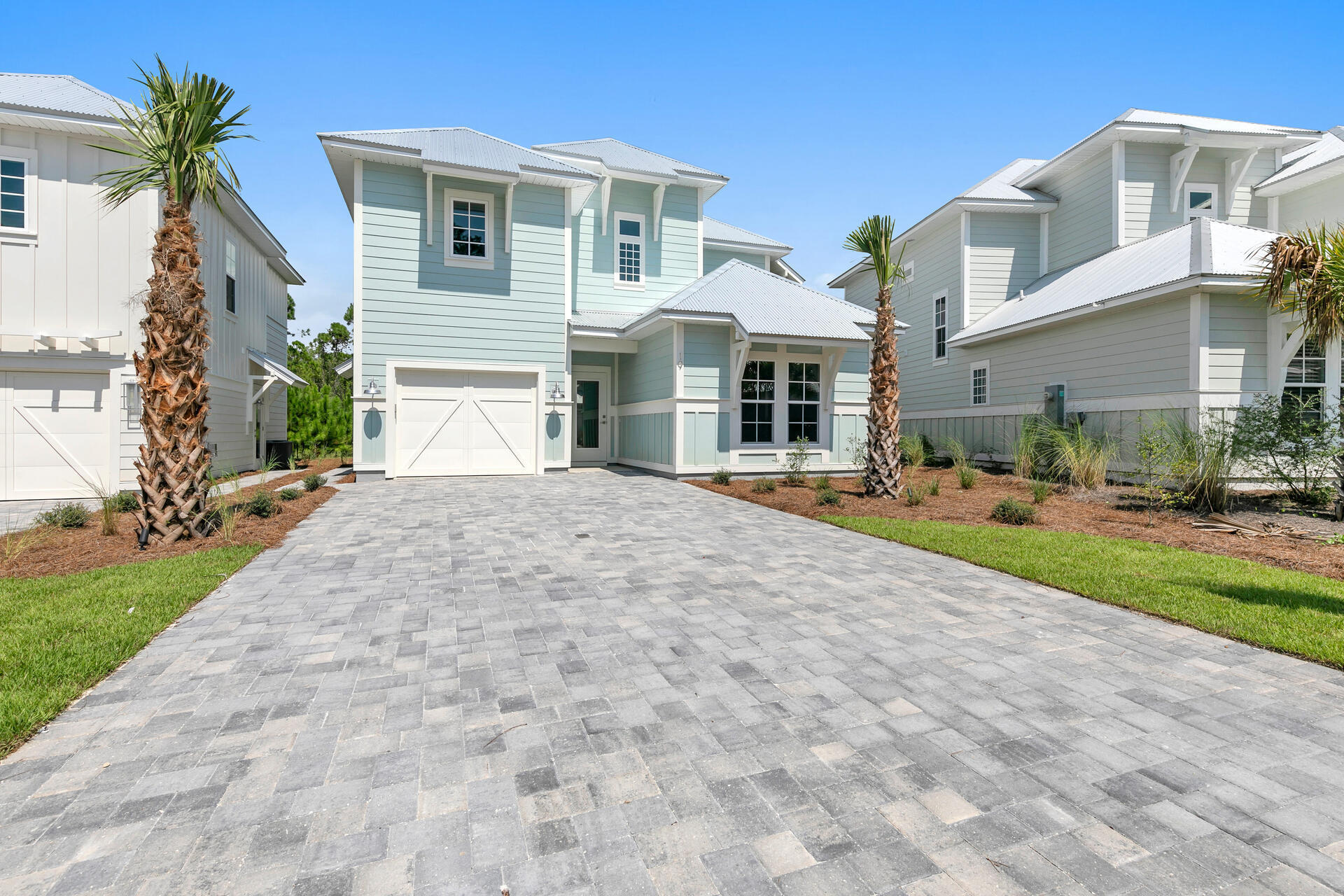 The HERON EXPANDED Plan-2132 SF. Brand new home located on the South side of Hwy 98-close proximity to 30A, shopping, restaurants and beach accesses. This four bedroom, three and a half bath home built by one of the premier builders on 30-A has marble & quartz countertops, stainless appliances & upgraded lighting. Seamless glass shower door in Second floor master w/ designer tile. Guest bedroom down w/ private bath. One car garage. A community Pool & Clubhouse invites relaxing days plus surrounded by Preserve State Lands. One year builder's warranty. NO Short-term rentals.  Six months or greater Allowed.  Expected completion-August 30, 2023.