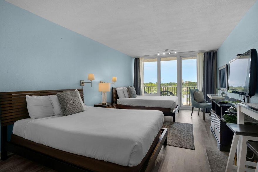 Located behind the gates of Sandestin Resort, this Bayside studio condo was recently updated in 2021 with LVP flooring throughout, tile in the bathroom and tasteful decor. Offering tranquil lake and golf course views, this unit is the ideal investment opportunity with gross rental income projected between $28,000-$34,000. This well cared for unit is being offered entirely furnished and features two queen beds and a functional kitchenette equipped with a mini fridge, sink and microwave. Bayside is a bayfront condo building conveniently located in close proximity to some of the most popular attractions in Sandestin including Sunset Bay Cafe, the Links Golf Course, the Sandestin Fitness Center and the Linkside Conference Center. Sandestin Resort is loaded with top notch amenities including