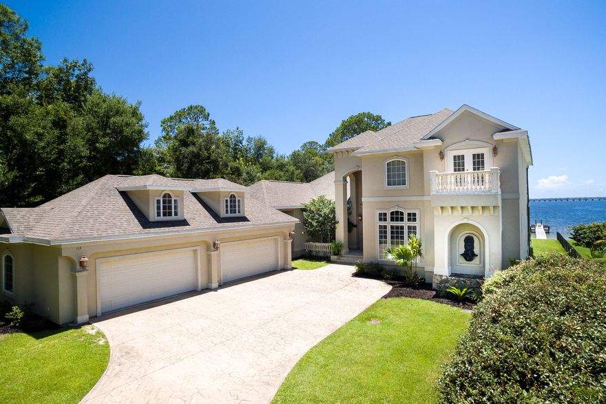 Life On The Bayou does not get any better than this custom designed, immaculate home. With panoramic views of beautiful Poquito Bayou from each room, the term 'livin' right'' certainly describes the lifestyle this home provides. This home is 4073 sq ft with an expansive lanai, 4 bdrms, 3 1/2 bath and a very large 4 car his/her garage. The home is energy efficient and all-electric with e-glass double paned high impact glass windows, geothermal heating/cooling and hot water (8 wells supporting the geothermal system), crystal water full home water purification/filtration system, and a greenhouse with water. The whole house has recirculating hot water for instant access. The first floor Master bedroom is 17'x18' with double trey lighted ceiling and 12' wide doors opening to pool and spa