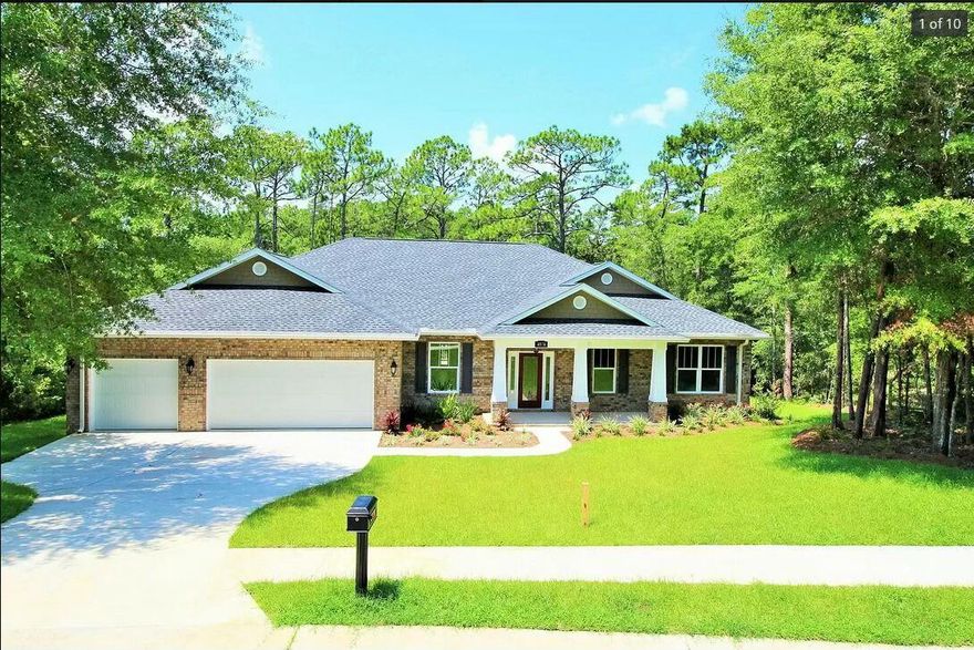 Your search ends here at this Beautiful newer home in the highly sought-after Rocky Bayou Country Club Estates! This Freshly Painted large family home boasts almost 3000 sqft ONE level living space plus 3-car garage on a sprawling 0.63 acre wooded lot w/ a creek behind. The welcoming open concept great room with a split floor plan with master on one side and 3 additional bedroom on the other offers the best of both worlds.  The 12-foot ceilings, large walk in closets, hardwood floors, tankless waterheater, gourmet kitchen, separate office and a formal dining room are just few of the special features that will make this an idea home for any family.  Relax in the screened-in Lanai facing the tranquil wooded (fenced) pool size backyard. You are only minutes away from A+ schools, golf course You are only minutes away from A+ schools, golf course, dining/shopping.  Rocky Bayou Golf Club and their recreational Pool is also within walking distance, along with many walking and biking path. Call today for a private showing. 