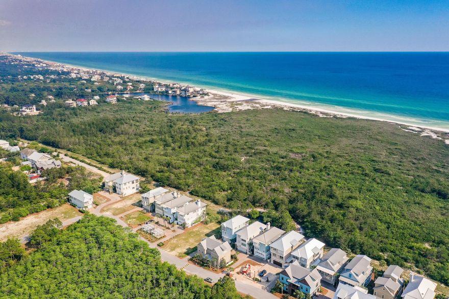 Planning and building your own personal beach house is an exciting, challenging and rewarding adventure, and choosing Cypress Dunes to build raises the bar on the reward. This innovative neighborhood hugs the eastern edge of Topsail Hill Nature Preserve. Renowned for its sand dunes, natural habitats, boardwalks and more than three miles of white sandy beach, Topsail Hill is so named for the dunes that look a bit like topsails. It's a desirable blend of resort, nature, security, luxury and amenities found in fine resorts. In close proximity to shopping, dining and entertainment, this may well be the best decision you make for a beach vacation home or year-round. The John Willis floor plan that fits this lot is the Wyndham floor plan. John Willis Homes builds custom homes and buyer must