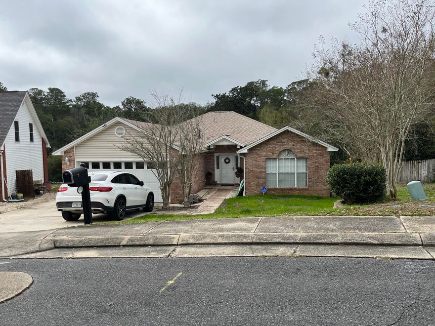 4 Bedroom, 2 Bath, 2 Car Garage with extra parking pad  on side of house for boat, jet skis, etc. Whole House Generac Generator. Automatic Sprinkler System with lawn pump supplied by Lake. Extra parking on concrete pad at side of house. Washer/dryer hook up in garage. 30 year Dimensional shingle roof installed 2020. Tankless water heater. Storm Door at Front Entry. Whirlpool Gold appliances with convection microwave. Auto water/ice in fridge door. Overlooks protected wet lands so no building in backyard! An acre pond with beautiful natural woods behind home. Oversized deck out back fit for relaxing and entertaining. Open living area dining and kitchen with breakfast bar. Minutes walk from schools. Survey available. Wrought Iron Yard fencing does not convey