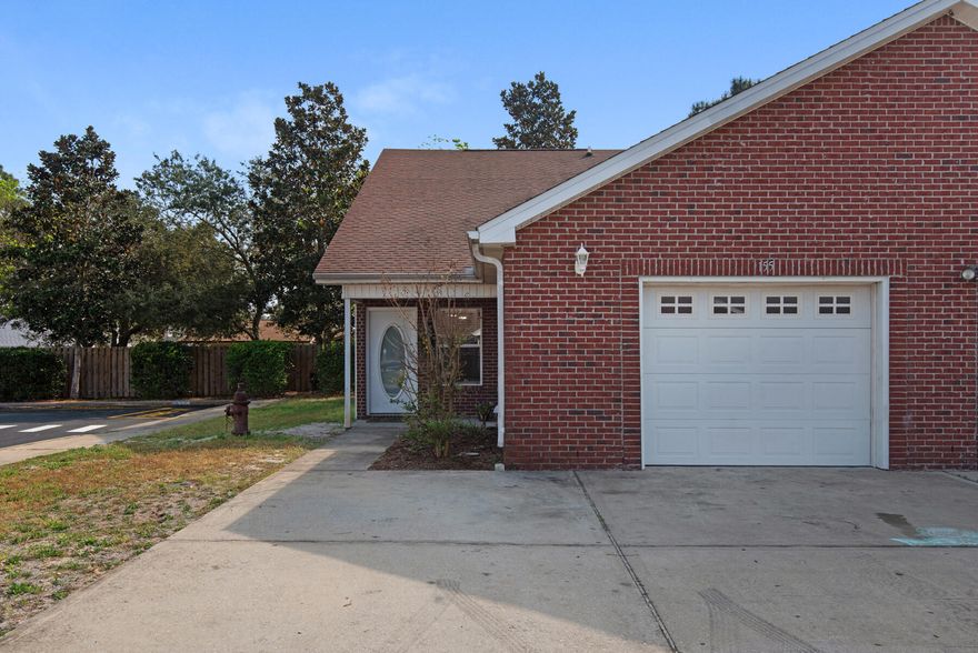 Bright, airy, and centrally located, this end unit townhome is a must see.  Located in the heart of Destin, tons of restaurants, shopping, and the beautiful white sandy beaches that make Destin loved by many. The recently renovated kitchen features newly painted white cabinets, new granite counter tops, new sink, and a nice sized pantry. The living room is stunning, with cathedral ceilings to emphasize the open floor plan. The principal bedroom is conveniently located downstairs, with additional 2 bedrooms and full bath upstairs. Also features an oversized one car garage with washer & dryer hookups and plenty of drive way space for additional parking.  No short term rentals allowed.