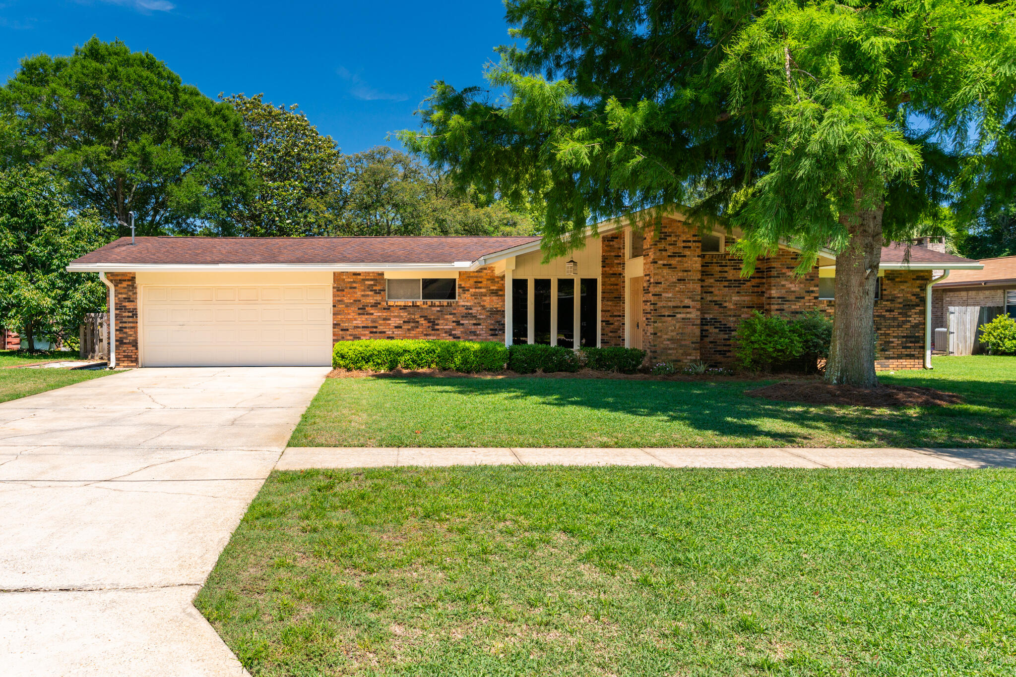 BACK ON MARKET NO FAULT TO SELLER Talk about a house in the heart of Kenwood! Beautiful curb appeal complete with shade from the mature trees, sidewalks and sparkling swimming pool. This timeless home checks all the boxes, complete with a renovated kitchen, upgraded appliances, cabinets, granite countertops, TWO living spaces, a formal dining room, and 4 bedrooms. Seller to replace roof prior to closing! The grounds have been meticulously maintained and a constructed workshop out back offers a space for tinkering and projects, while the full house generator (2021) provides peace of mind. With a 2021 water heater and 2021 HVAC system, this home is not only beautiful but also equipped with modern conveniences and reliability. It's a gem and just around the corner from Kenwood Elementary. Schedule a showing today, and discover your home where memories are made and cherished for years to come.