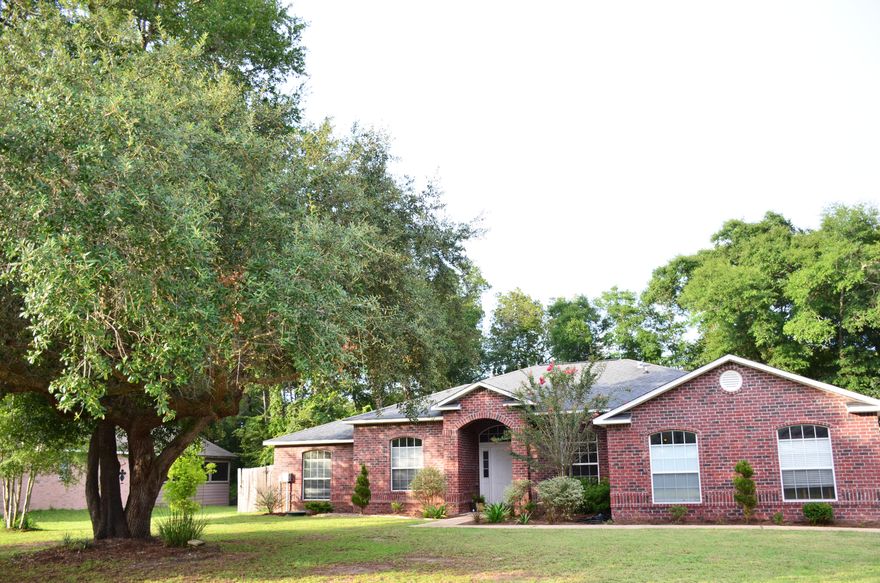 Welcome Home!!Beautiful well maintained home in Waterview Cove! This ALL brick 4 bedroom home sits on over a 1/2 acre lot!Spacious 17X16 master bedroom and bath has double vanity, garden tub and seperate shower and his and her walkins. All additional bedrooms provide ample space for your growing family. Big beautiful kitchen with island, separate dining and breakfast nook. Living room is perfect for those family movie nights accented with a cozy fire.Backyard is fully fenced and home to gorgeous patio and trellis. Storage shed perfect for all of your outdoor toys and yard equiptment. Located just 30 minutes from the beaches of South Walton and 30 minutes from the beaches of Destin.This home is ready for you and your family to make many lasting memories!Schedule your showing today!