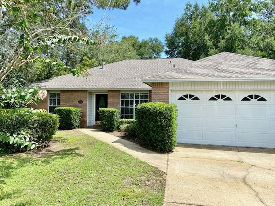 AVAILABLE OCT. 16. Nice corner lot in Parkwood Square. Great split bedroom floorplan features formal dining room and eat in kitchen with island, gas stove (no refrigerator), cozy gas fireplace, screened back porch and large privacy fenced back yard. Conveniently located to Bluewater Bay Elementary as well as shopping and dining. Owner will consider a pet under 50 pounds that is spayed/neutered and fully housebroken with a non refundable pet fee. Anyone 18 or over wishing to live in the property must fill out an application and be on the lease. Tenants required to carry renter's liability insurance while occupying the property