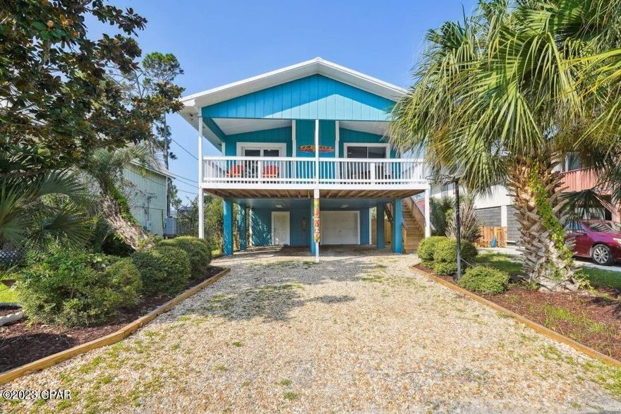 Welcome to your cozy retreat in Panama City Beach! Rental projections at $60K! This 3-bedroom, 2-bathroom property, just steps from the beach, offers a laid-back atmosphere perfect for your family getaway. With a bunk room for the kids, it comfortably sleeps 8. Making it a great opportunity to own an income producing vacation rental. Recently renovated, this home radiates a beachy charm. Enjoy lazy afternoons on the big front porch or gather around the outdoor fire pit for a relaxed evening. Rinse off the beach day in the convenient outdoor shower. The kitchen is well equipped for large gatherings, and family games on the island. This home is practical and inviting choice. Come experience beach living without breaking the bank - schedule your showing today!