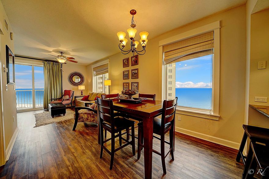 Fully furnished, rental ready! This beautifully appointed condo at Grand Panama is nicely furnished and ready for a new owner. This would be great rental or second home. This full 3 bed/3 bath property includes a ''bunk'' area that is currently being used as an office space. The fully equipped kitchen features granite countertops and stainless appliance. Enjoy sunset views from your balcony directly across the street from the gulf. Grand Panama is loaded with amenities such as 2 pools/ 1 heated, kiddie pool, spas, Tiki Bar, barbecues, Fitness center.