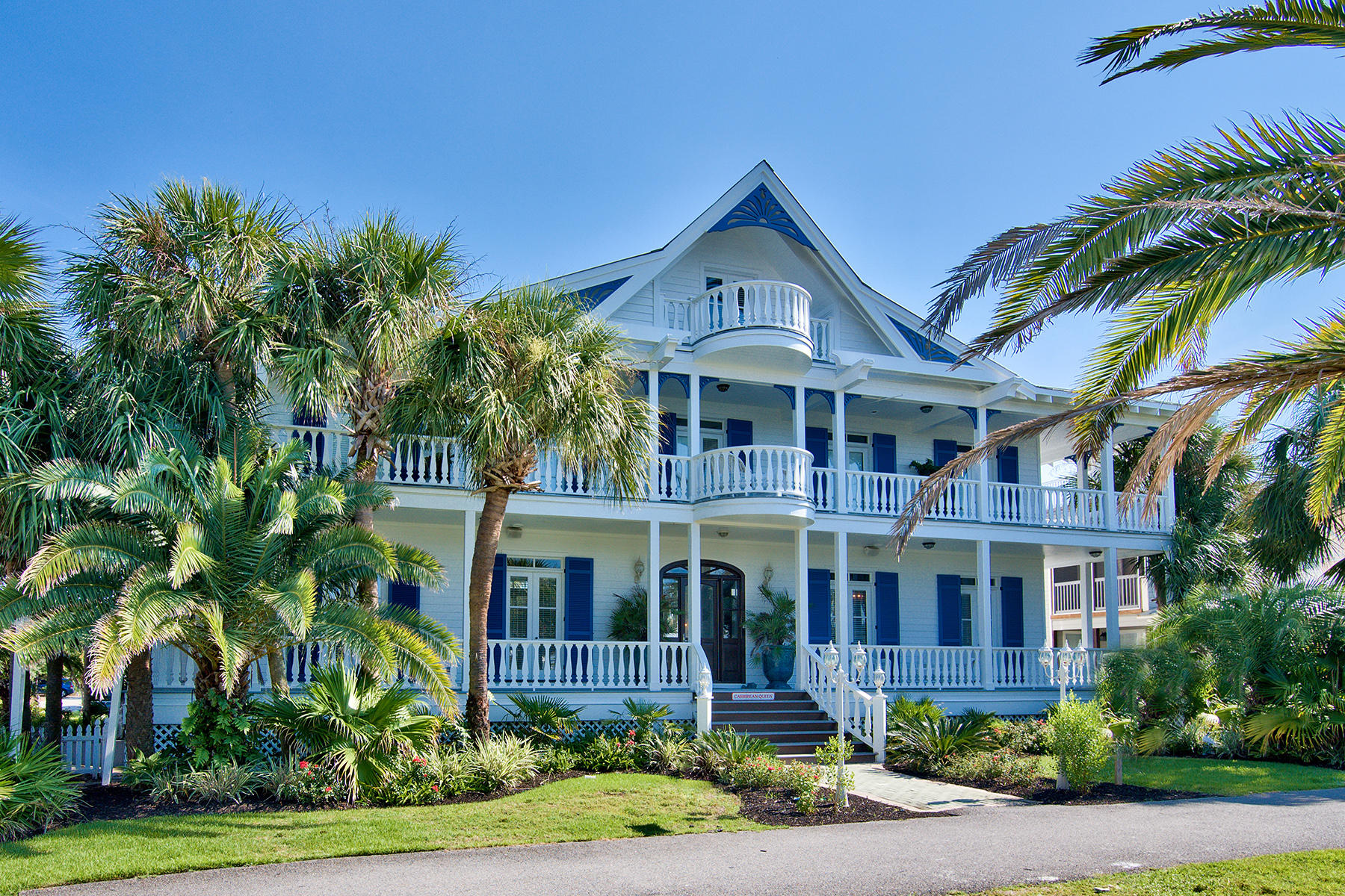 Caribbean Queen's whimsical exterior is a traffic stopper and its marvelously renovated interiors, a stylist's haven. Gulf views and conveniently located beach access make this home an alluring retreat and a rental winner. Caribbean Queen is one row off the gulf coast and located in Destin's Crystal Beach neighborhood. With attention to timeless details this home was remodeled in 2015 and is projected to generate over $142K in rental income in 2017. As you enter through the oversized front door you see the central circular stairway with wrought iron railings accented by arched entrances to the east and west wings of the house. Large windows and French doors provide the home with natural light and give this home a French-county charm. The kitchen features leathered quartz countertops... classic white cabinets and stainless steel appliances including a 6-burner gas range top and oversized fridge. A spacious private dining room sits just off the kitchen. French doors from the kitchen lead to the private courtyard. The courtyard has a private pool and provides a great area to relax, swim and grill out. Through the east wing arches, you enter the living room with a wood burning fireplace. The main floor master bedroom is complete with a luscious private bath. The second-floor features 3 bedrooms including a second master bedroom and a loft area. One bedroom includes four recently added bunk beds. Each second-floor room has French doors that lead to a deep wrap-around balcony, allowing guests to open the doors and feel the gulf breeze or step out and gaze off into the mesmerizing sparkling water of the Gulf of Mexico. The third floor is a cozy loft with two twin beds, private bathroom and a balcony perfect for sitting and relaxing while taking in the amazing views. This home is a rare combination of tasteful appeal and beachside convenience. Call for a private showing.