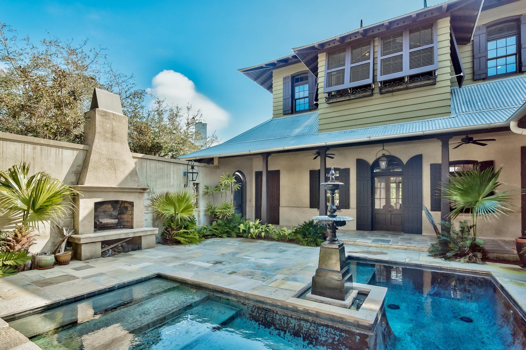 Light & airy colors with rich dark wood, natural textures, exotic textiles and touch of old-world charm, make this 4,500 square foot Rosemary Beach cottage. Step inside this classic British Colonial Style home and be welcomed by pristine features and finishes like the open foyer that leads to the formal dining room, a beautiful gas fireplace