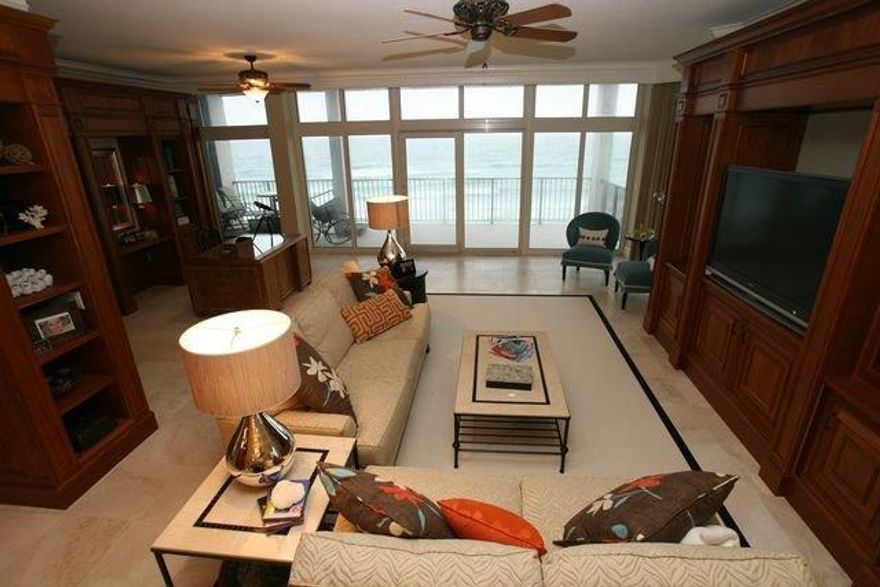 This unit was completely renovated and includes a bunk room. Everything including the metal studs were replaced with the finest materials. The windows are 150mph German impact resistant glass, travertine floors throughout, marble/granite counter tops, extensive custom cherry cabinetry and built-ins, Wolf/Sub-zero appliances, built-in cappuccino maker, Kohler faucets,