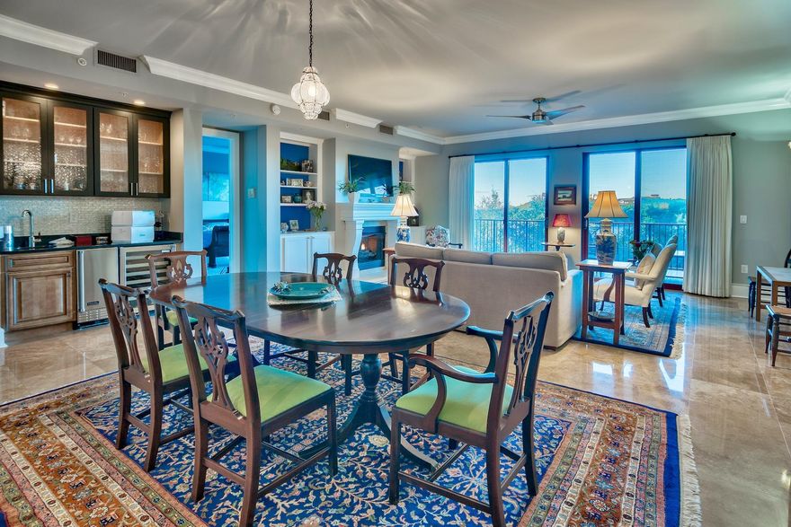 This really is your Sanctuary by the Sea. Wide angle views of Big Redfish coastal dune lake and the Gulf make this the perfect choice. Meticulously maintained, this 3 bedroom, 3.5 bath condo feels more like a home. The open, expansive floor plan, crown molding and 10 foot ceilings offer versatile dcor options and is perfect for cozy family gatherings or entertaining friends. Travertine flooring spans throughout all areas with carpet in master bedroom bedroom. Professional Viking stainless steel appliances including gas range with pot filler faucet, double oven and oversized refrigerator, headline the gourmet kitchen and are accentuated by the custom cabinets and granite counter tops.