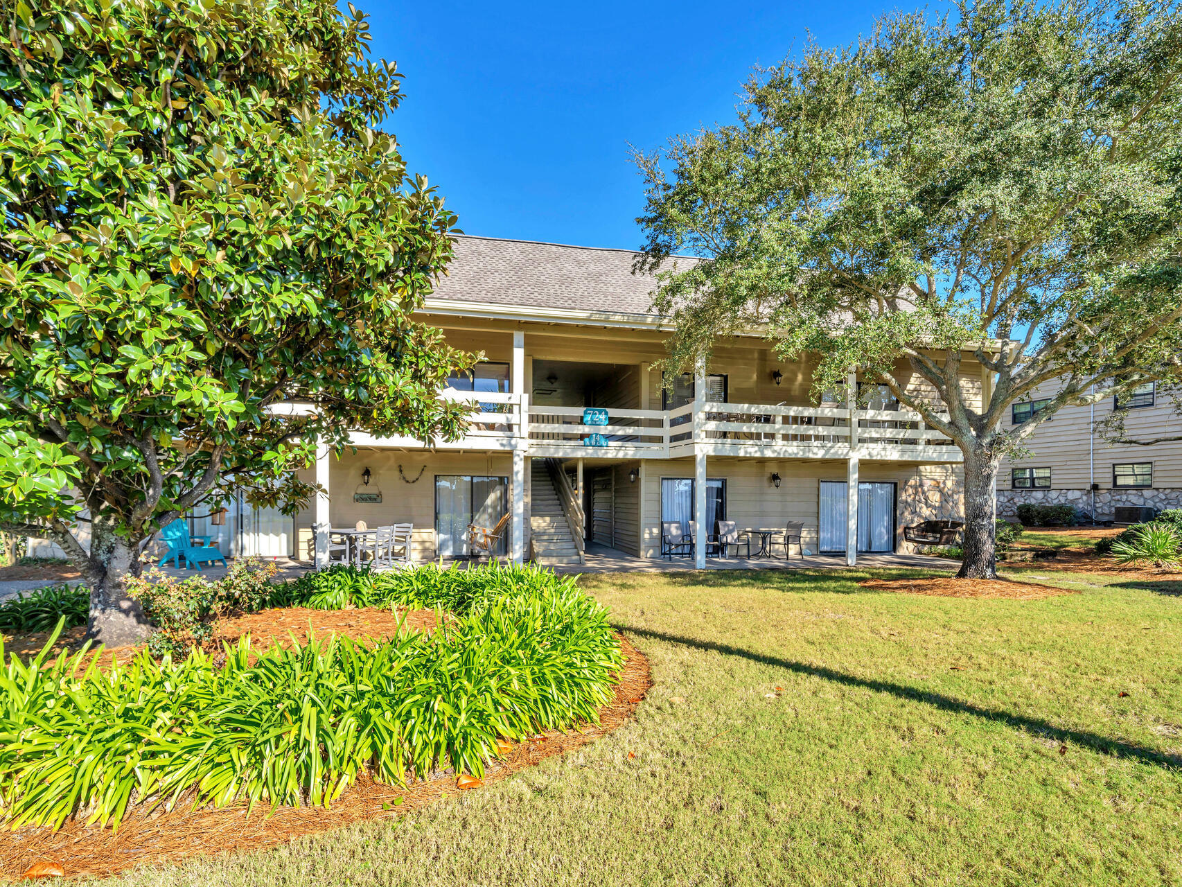 Rare find !  First time on market on over 25 years!  Come and enjoy this lovely 3 bedroom golf villa on Stewart Lake with a view of the magnificent Gulf of Mexico from your balcony.  Sold fully furnished, this spacious unit is a great second home or an excellent rental property.  Plenty of room for family, friends and memories to be made!  One of the best locations in Seascape, you can choose your activity each day.  Choices are pickleball, 5 Swimming pools, golf, tennis, cycling, short walk to the pristine white sand beaches and emerald waters or if you prefer, just relax from your balcony and take in the beauty and majestic views of Stewart Lake and The Gulf of Mexico. This unit has never been on a rental program and now is your chance to own a piece of paradise and make it your own