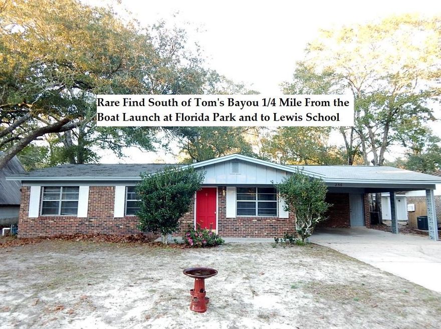 Grab the Boat and the Kids! Rare Find Under $200,000 South of Tom's Bayou. Less than 1/4 mile to Lewis School and Florida Park which has a PUBLIC BOAT RAMP. Half a mile to the Eglin East Gate on the last road on the left before the Base Gate. New Cooper wiring professionally installed and inspected. New Flooring throughout. 3 Bedrooms with a Hollywood style bath from the Hallway and the Master Bedroom. All brick home with newly painted exterior trim. Nice Living Room and Dining Area with a French Door leading to the backyard. This is a Nice Level Lot. All new screens in the windows. Buyer to verify all measurements and anything of importance to them. Seller has never lived in the home and is to be sold as is with the right to inspect. Conventional or Cash Only. Clear Wood Rot an Termite.