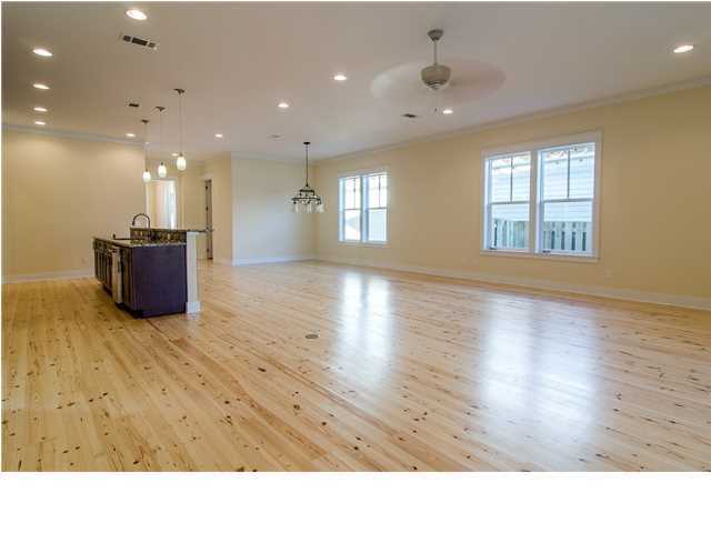 The homes of Spyglass Hill comprise an intimate grouping just east of County Highway 393, less than one half mile from the Ed Walline Park public beach access, located at the intersection of Scenic Highway 30A and 393. Attractive cottage features appoint the exterior of this three-bedroom home with second-floor bonus room and enclosed two-car garage. They include a metal roof, Hardi siding, six-inch tongue and groove pine ceilings on both front and back porches as well as Jeld Wen Premium windows. Beyond the Signature Mahogany front door, the cottage theme continues. Wood cottage cased windows and two-panel doors join six-inch base molding and two-piece crown molding that accents the nine and 10-foot ceilings. Heart pine floors carry throughout the principal living areas of the home