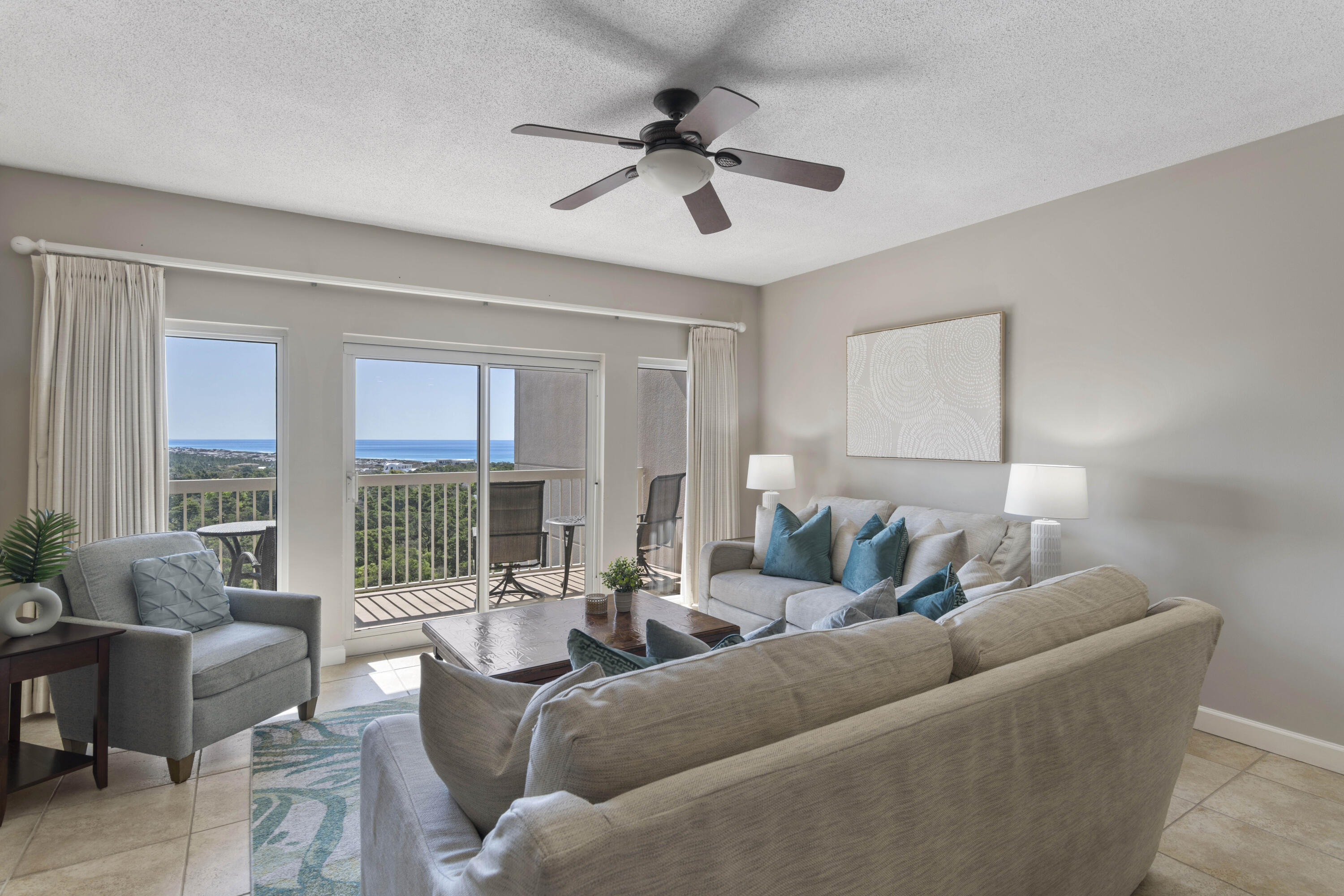 Experience the best of coastal living in this beautifully renovated 2-bedroom, 2-bath 9th floor end unit located at The Summit within the prestigious TOPS'L Beach & Racquet Resort, a gated Gulf-front community bordered by sugar-white sand beaches & serene nature preserve. This east-facing condo offers sweeping views of the coastline & Topsail Hill Preserve State Park from the comfort of your private balcony, accessible from both the living area & primary bedroom. Watch deer & other wildlife as you sip your morning coffee while the sunrise reflects off the Gulf. Enjoy the best of both worlds with stunning views of the Choctawhatchee Bay in the distance as you walk from the elevators to the unit, and views of the Gulf as you walk from the unit to the elevators. The kitchen was redesigned relocating the owner's closet to maximize the breathtaking Gulf views the moment you enter the condo. The kitchen now boasts expanded counter space, quartz countertops, tile backsplash, stainless steel appliances, tray ceiling with recessed lighting, and under-cabinet lights. Durable tile floors extend throughout the common areas, ideal for low-maintenance coastal living. This turnkey unit is tastefully decorated and comes fully furnished. The open concept is perfect for entertaining with dining space for 6 and an electric fireplace to enhance the overall ambiance. The primary suite features a king bed, sitting area, and extra windows exclusive to end units bringing in even more natural light and scenic views. The elegant en-suite bath offers a walk-in tile shower, while the guest bath features a tiled shower/tub combo for those who appreciate a relaxing soak. The guest bedroom includes two twin beds and benefits from a split-bedroom layout, offering added privacy for all.
Owners and guests enjoy exclusive access to The Summit's community pool, hot tub, and BBQ area, plus all of TOPS'L's resort-style amenities: 600 feet of private beach, beachfront pool & tiki bar, state-of-the-art fitness center, an indoor/outdoor pool for the colder months, 12 Rubico lighted tennis courts, pickleball, basketball, shuffleboard, mini golf, and 3 on-site restaurants all on 52 acres of lush Gulf-front property. Whether you're seeking a primary residence, second home, or a high-performing investment property, this incredible Summit condo at TOPS'L checks all the boxes and is in a one-of-a-kind setting!