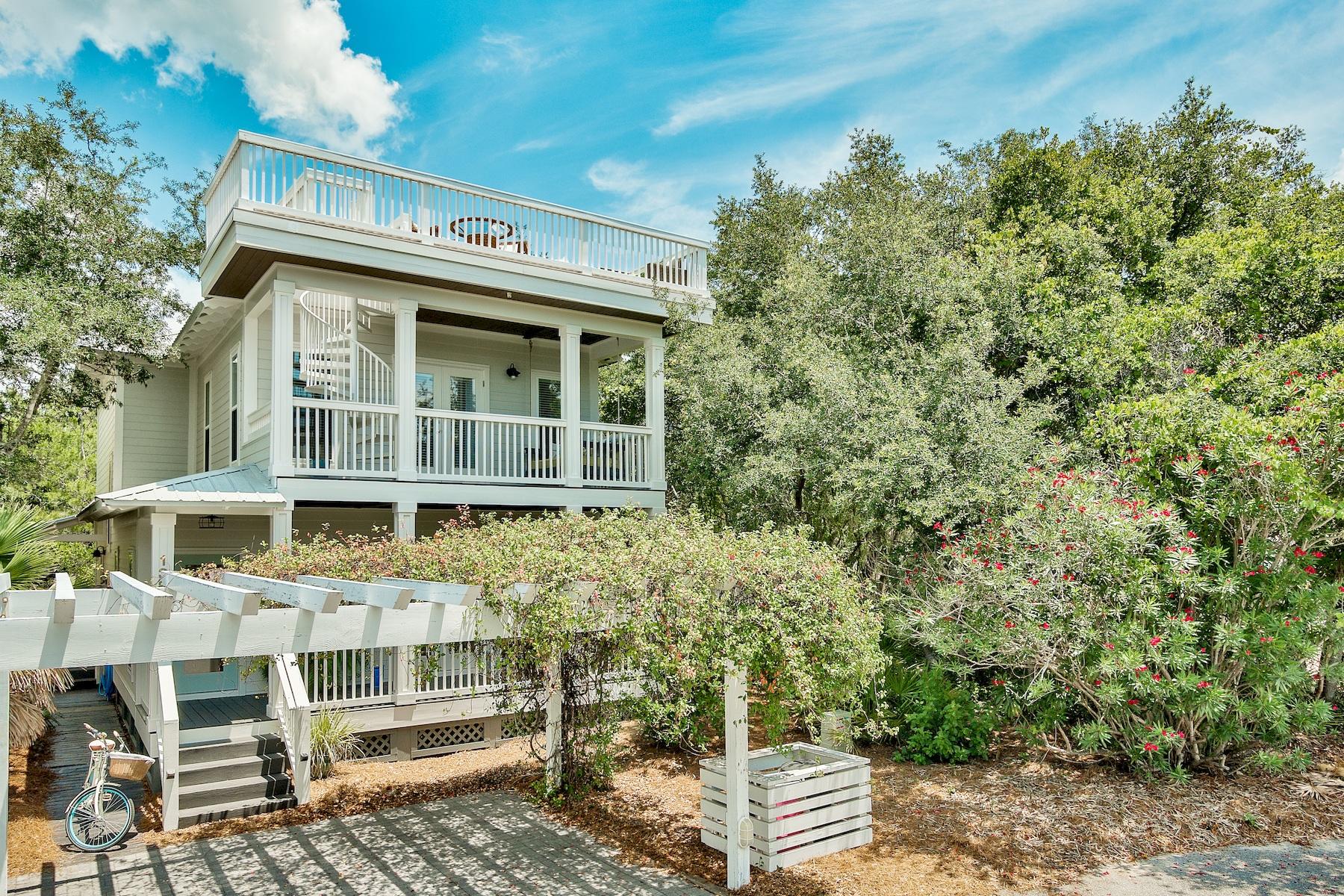 This home is the perfect vacation home or turn key rental investment! It's sold furnished with a small exclusion list. This property is located on a corner lot that backs up to Camp Creek Golf Course, providing a nice private setting. This home is the only home in Cottages at Camp Creek that includes a rooftop terrace offering added space for entertaining and beautiful gulf views! The property also offers a side walkway to a nice outdoor shower and an additional side porch. The deeded beach access leads to uncrowded beaches and this neighborhood is located just 1 mile from Alys Beach and 2 miles from Rosemary Beach. Updates include: Newly remodeled roof top terrace with Trex like roofing material in December of 2017. Hardwood floors installed in December of 2016, and the entire interior was repainted in December 2016; entire exterior painted fall of 2017. One AC unit installed in April of 2017. The other was installed in August of 2015.