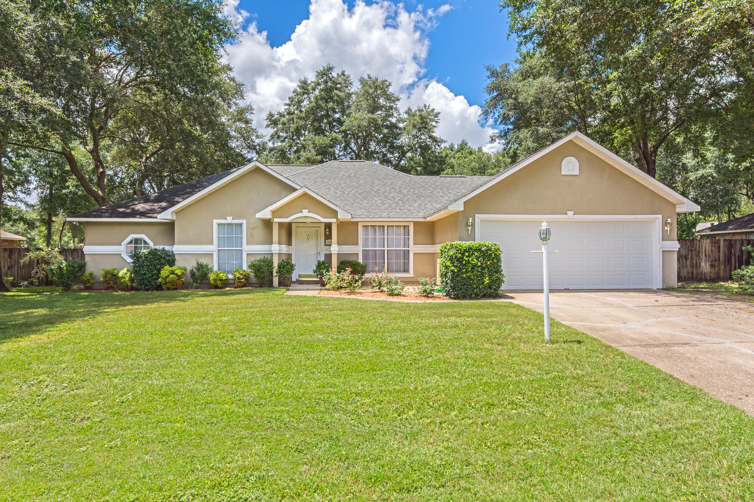 Stop the car and look no further, this meticulously maintained home is a must see. Your new home is located South of I-10 providing a easy commute to your local bases, beaches, shopping, restaurants, and more... Home features wonderful architectural design and touches throughout. Nothing says ''Home-Sweet-Home'' quite like walking into this cozy living room with its gorgeous custom fireplace overlooking your fenced in backyard. The home comes well equipped with a spacious floor plan, raised ceilings, ceramic tile flooring, a large master suite, updated kitchen from top to bottom with new cabinets, counter tops, flooring, and stainless appliances to meet all of your cooking desires. This lovely home also features a enormous family room that will surely meet your needs at family gatherings.