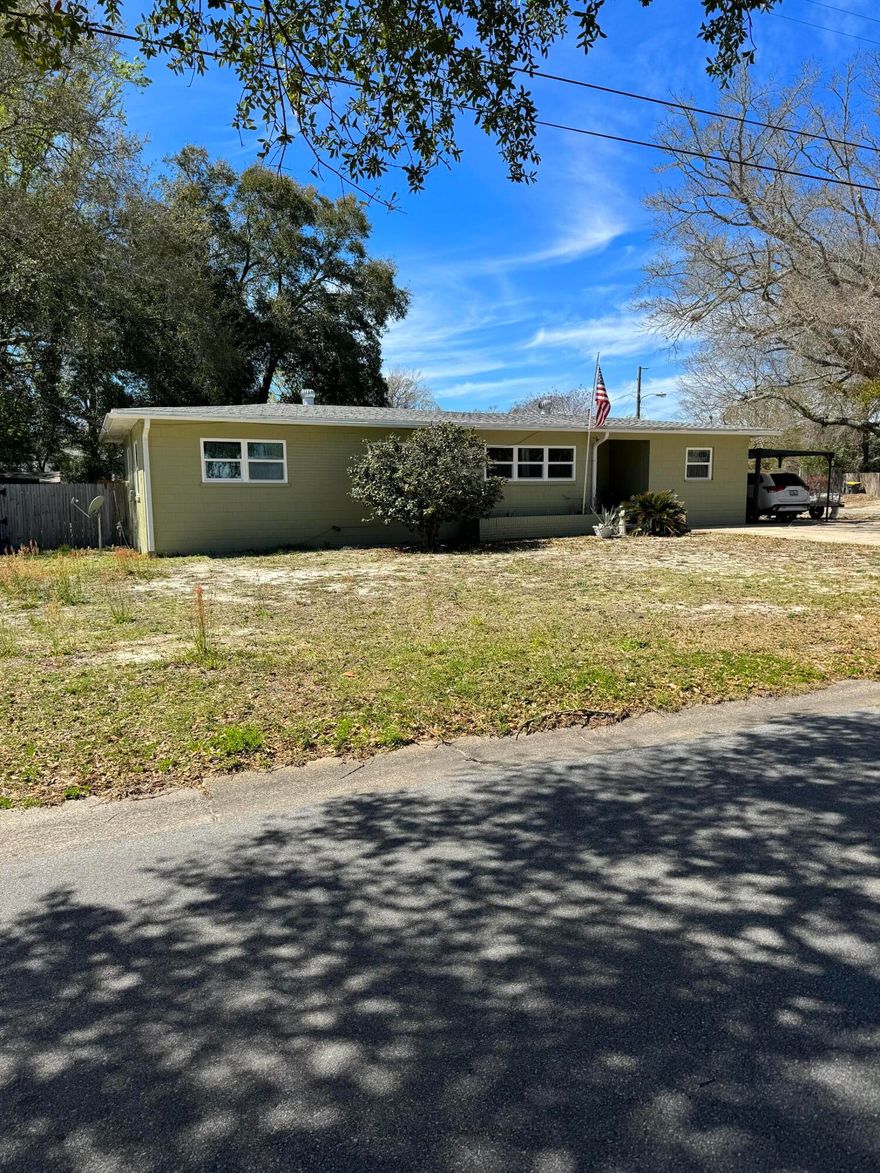 Centrally located in the heart of Fort Walton Beach, this recently updated home sits on a spacious corner lot, offering both comfort and convenience. With a new roof, HVAC system, hot water heater, windows, gutters, and soffit, this three-bedroom, one-bathroom home is ready to welcome a new family. The kitchen boasts modern cream cabinets paired with sleek granite countertops, creating an inviting space for cooking and gathering. The garage has been thoughtfully enclosed, adding a versatile bonus room, with the laundry area conveniently located just off of it. Outside, a large shed provides extra storage, while a newly installed lawn pump ensures that the expansive corner lot is well-maintained. This home truly combines modern updates with practical features, making it an ideal choice for your family.  
* Seller is in the process of moving out**
Don't miss your chance to bring your own personal touch to this wonderful home in Ft.Walton Beach. 

* More pictures coming soon *
Sheds with garage door does not convey

2024-2025 updates:
Roof
HVAC
hot water system 
windows
gutters
soffits
exterior paint
lawn pump 