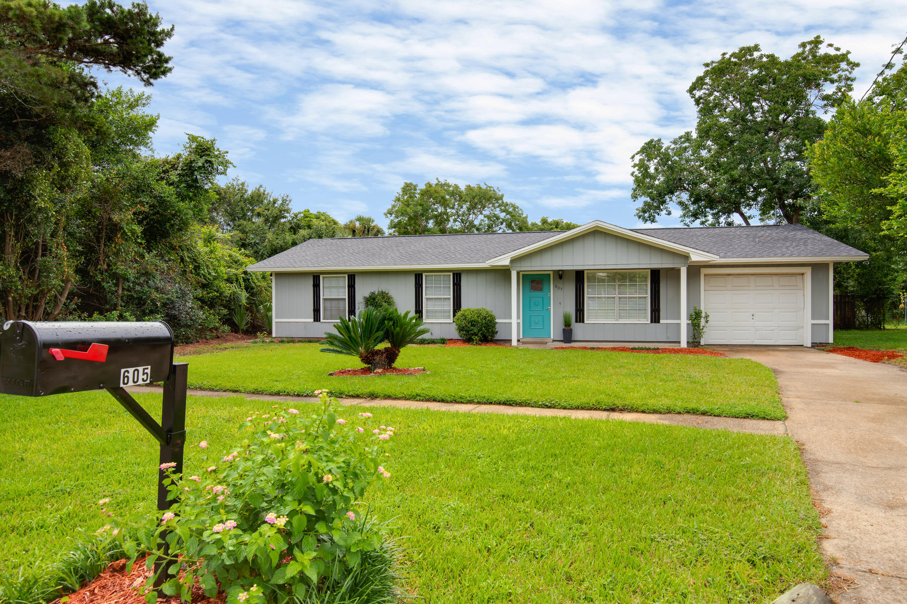 Don't miss your chance to own this newly renovated cul-de-sac home in the heart of Destin. This 3bed/2bath home has a new roof, new interior and exterior paint, all new wood-look tile in living/kitchen areas, new carpet in bedrooms, new kitchen with granite/decorative hood/pot filler, new lighting, new new porch roof, and even new sod in the yards. Located just around the corner from the Destin Harbor and just down Beach Drive from Mattie Kelly Park and Joe's Bayou Boat Launch, you'll find easy access to all that West Destin has to offer. This won't last long... So, call today for a private showing!