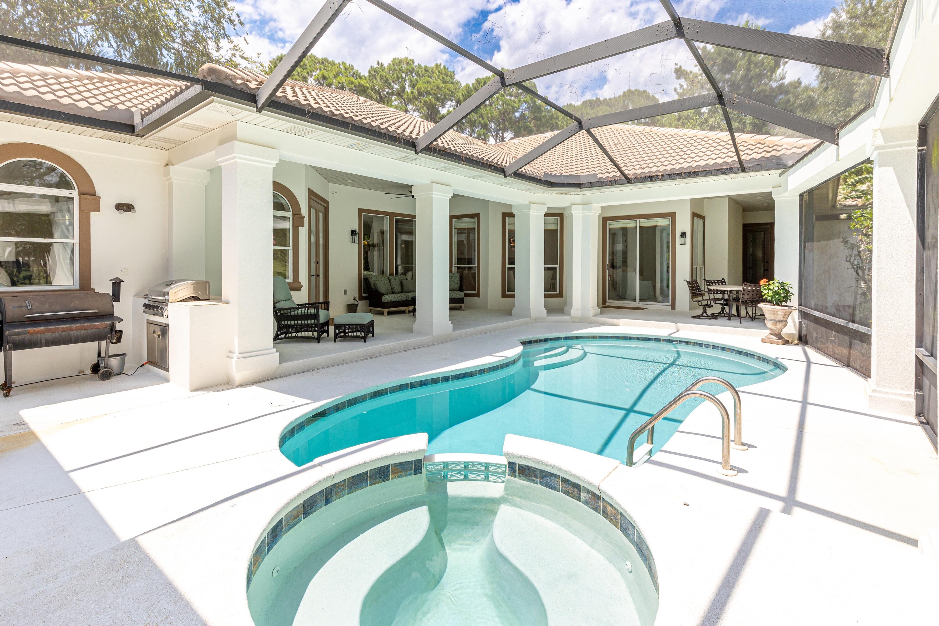 Step into luxury at this Burnt Pine Golf Course gem. Meticulously renovated, this elegant home features a chef's kitchen with quartzite countertops, Thermador appliances, and a custom wine wall--perfect for intimate gatherings. The spa-inspired master suite offers a retreat-like escape, complete with modern fixtures. Outdoors, a screened-in heated pool and spacious patio provide the perfect setting for year-round relaxation and alfresco dining with golf course views. Located on hole 4 of the exclusive Burnt Pine golf course, this is your chance to embrace coastal elegance and resort-style living. Schedule a private tour today.