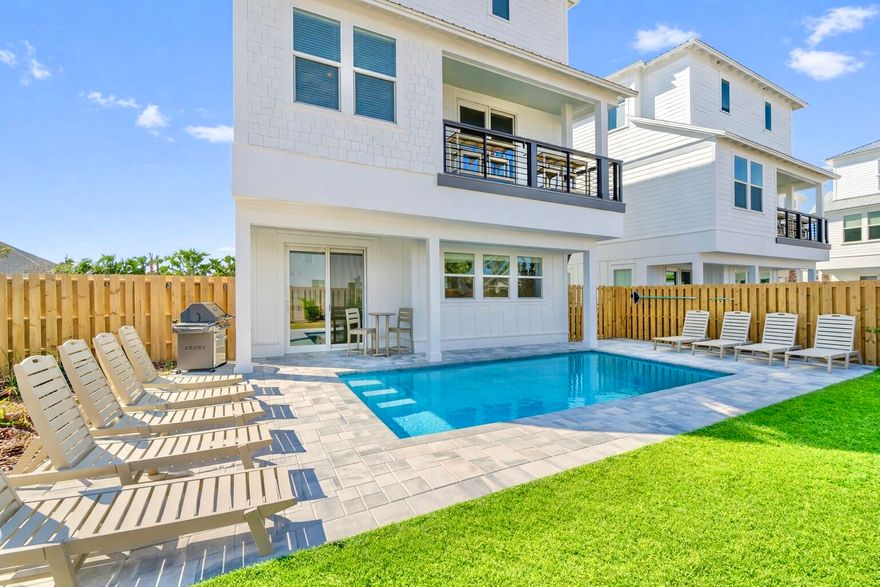 The current property management company is offering a $185,000 rental income guarantee for 2027, providing a compelling opportunity for investors seeking both immediate cash flow and downside protection. Welcome to 8 Blue Ohana Court in Miramar Beach, a fully furnished and turnkey 7-bedroom, 7.5-bath luxury vacation rental designed for strong short-term rental performance and immediate income generation. This spacious three-story home comfortably sleeps up to 22 guests and is being sold completely rental-ready, including a brand-new 6-seat street-legal golf cart, allowing for a seamless transition for any investor. The property already has over $120,000 in bookings secured for 2026 and is projected to finish the year at approximately $170,000 in rental income despite a delayed start in late February, with projected revenue for 2027 estimated between $190,000 and $210,000.

The home is purpose-built to maximize occupancy and revenue, featuring five king suites with private bathrooms and two high-capacity bunk rooms designed for large groups. The open-concept layout includes a chef's kitchen with a gas range, expansive living and dining areas, multiple lounge spaces, and a dedicated game room, all thoughtfully designed to enhance the guest experience. The private backyard offers a resort-style setting with a heated pool, covered outdoor living space, and ample room for entertaining, which are key drivers for repeat bookings and premium nightly rates. Multiple balconies and gathering areas throughout the home provide both privacy and functionality for large groups, and a community sand volleyball court is currently being constructed, adding another attractive amenity for guests and enhancing overall rental appeal.

Ideally located just about a one-minute golf cart ride to Miramar Beach's largest public beach access, the property offers easy access to the Gulf along with close proximity to Destin, Sandestin Resort, and Scenic Highway 30A. Guests benefit from nearby dining, shopping, and entertainment, further supporting consistent rental demand year-round. This property stands out as a high-performing, income-producing asset with future bookings already in place, professional management available, and no additional setup required, making it an exceptional opportunity for investors seeking a proven luxury vacation rental in one of the Emerald Coast's most desirable markets.