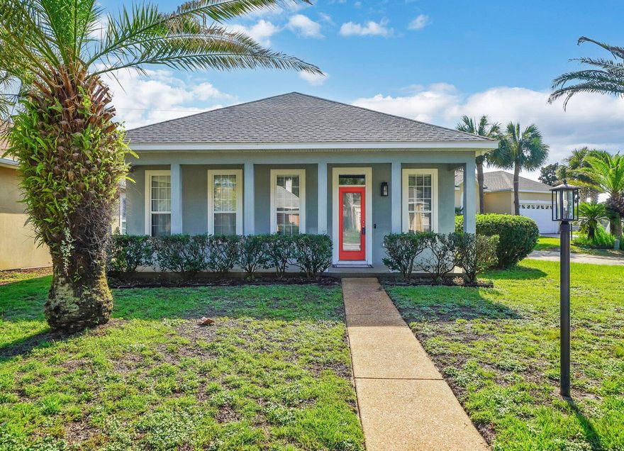 Do not miss an Opportuinity to own this quaint Two bedroom, Two full bath home with flex room (nursery, office or den) located off Master Bedroom. Flex room has doors leading to privacy fenced back yard and garage.  Luxury Vinyl Planking throughout and renovated baths bring a contemporary flair to this open floor plan that creates a seamless flow throughout.  Located on the south side of Highway 98, the white sandy beaches and emerald green water of the Gulf of Mexico are only minutes away.  Explore the vibrant dining scene, indulge in retail therapy, or immerse yourself in the many recreational activities. Embrace the natural beauty of the area and make cherished memories in this captivating home with covered front porch.