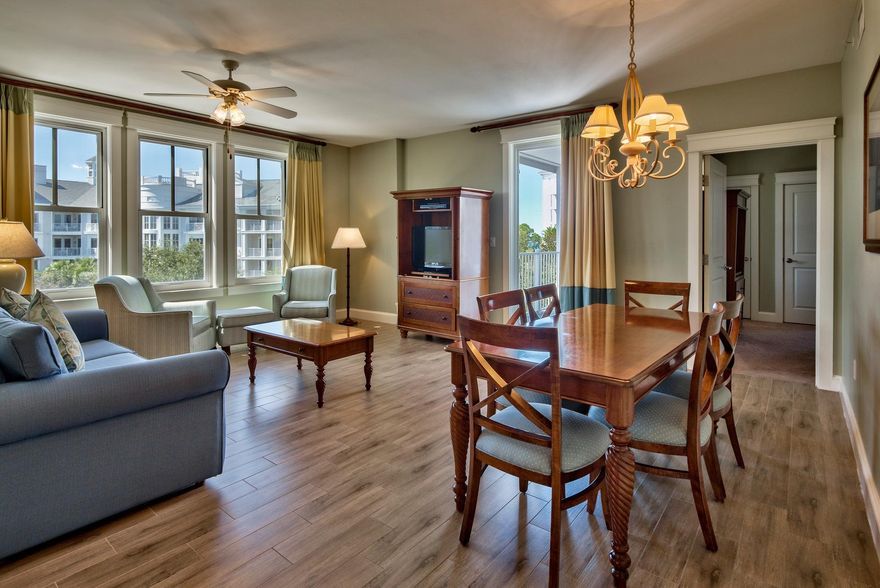 Enjoy incredible views of the Choctawhatchee Bay and Grand Sandestin Pool from the large private balcony of this bay-facing corner condo. The living area has ceramic plank tile flooring throughout for easy maintenance and a sleeper sofa to accommodate extra guests. Master bedroom has a king size bed and an en suite master bathroom with double vanity, separate shower, and large soaking tub. There is an owners closet and separate storage cage for extra storage.