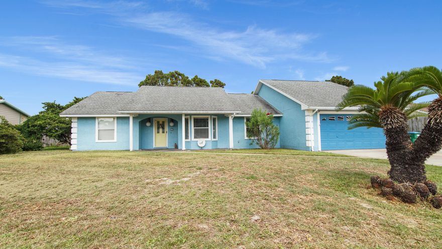 Welcome to your slice of paradise on the beach side of the bridge! Located just 1 mile from the sugar-white sands of the Gulf, this beautiful partially updated 3-bedroom, 2-bath home offers the ultimate in Florida coastal living with no HOA and easy access to the area's top restaurants, shopping, and entertainment.Step inside to discover a bright, open living area with vaulted ceilings, a cozy gas burning fireplace, and luxury vinyl plank flooring throughout the main spaces. Large sliding glass doors flood the space with natural light and lead to the show-stopping screened-in pool area--your private backyard oasis, perfect for relaxing or entertaining guests year-round. The television and shelving below it convey with the home. The kitchen features sea foam green cabinetry, stainless steel appliances that include a Bosch brand stove and dishwasher, and a breakfast bar that opens to the living and dining areas, creating a perfect flow for gatherings. The spacious primary suite offers a spa-like ensuite bathroom complete with double vanity, soaking tub, and a separate shower.

Both bathrooms have been thoughtfully renovated with modern finishes. Each of the bedrooms offers ample closet space and ceiling fans. 

Outside, the fenced backyard surrounds the oversized screen-enclosed pool and covered patioideal for BBQs, morning coffee, or an evening swim. The two-car garage and wide driveway offer plenty of parking for your beach toys, golf cart, or boat. The home is also wired for an auxiliary generator. You just need to plug one in near the electric meter outside. 

Convenient to the Navy Base, with quick access to Thomas Drive's beachside dining, St. Andrews State Park, and all the excitement of Panama City Beach.

Whether you're searching for a primary residence, vacation home, or investment opportunity, This home is a rare find in a sought-after location. Also, NO HOA FEES! 

Schedule your private tour today and start living the beach lifestyle you've been dreaming of!
