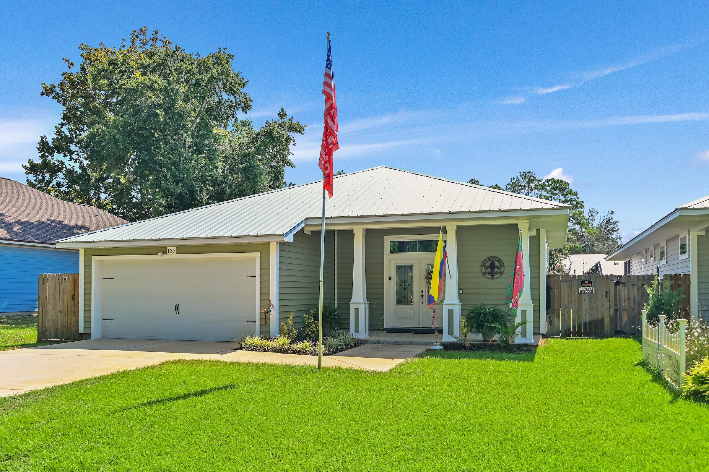 Welcome to your dream home situated in a non-HOA community close to Destin, Niceville, Bluewater Bay, and Eglin AFB! This 3-bedroom, 2-bathroom home, built in 2020 by James Taylor, features 10-foot ceilings and an open floor plan, perfect for entertaining. As you enter the home, you'll find a laundry room with additional storage or pantry space. On the opposite side of the foyer, there's a built-in locker area leading to the garage. The finishes include granite and butcher block countertops, with no carpet--just premium vinyl flooring or tile throughout. The kitchen boasts a breakfast bar and ample space for a dining table. The master bedroom comes with a spacious bath, his and her sinks, and a large walk-in closet with shelving. This quality built home features a metal roof with blown in insulation-current owner has never had an electric bill over $135! If you love the outdoors, you'll appreciate the screened-in back porch and the sizable fenced backyard with an irrigation system! Schedule your appointment today to view this turn-key home!