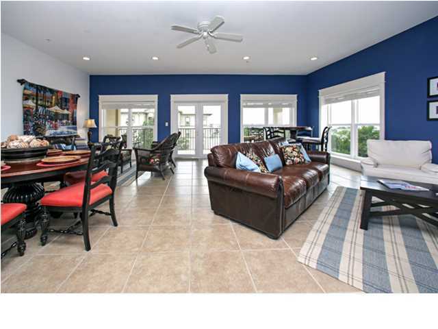 SailWatching Landing is a gated community on Santa Rosa Sound in the historic Brooks Street area of Ft. Walton Beach. French doors flanked by large windows in the light-filled living room with gas fireplace lead to an expansive covered balcony that runs the width of this top-floor condo unit, which captures expansive views of Santa Rosa Sound and glimpses of the Gulf of Mexico beyond Okaloosa Island. Tile floors carry throughout the principal living areas while plush carpet appoints each of the bedrooms. The stylish kitchen features a breakfast bar, attractive wood cabinets with brushed metal pulls and under cabinet lighting, as well as granite counters and stainless steel appliances. A laundry room with full size washer and dryer units is conveniently located inside the unit while a