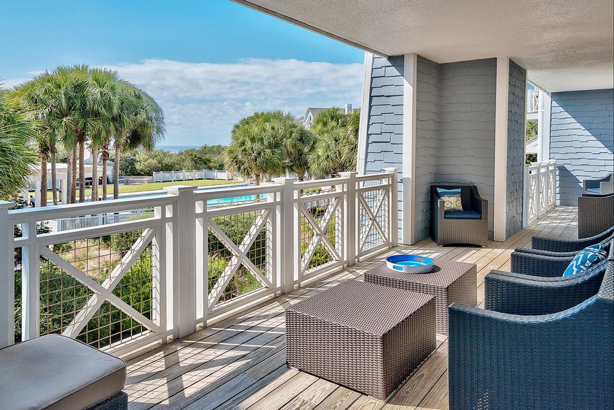 This adorable corner unit is the quintessential coastal-chic beachfront residence thoughtfully configured with two stories and a single car garage as well as an exceptional balance of indoor and outdoor living space with large wrap around porches on both the first and second levels that take full advantage of the lush landscaping and gorgeous gulf views that the Crossings at Watersound provides. Perfect for a second home or rental investment property; this unit is outfitted with beautiful finishes including white oak hardwood flooring throughout, elegant wainscoting, custom cabinetry in the kitchen & bathrooms as well as designer furnishings inside & out. The first level does not require any stairs to access & features three large bedrooms with ensuite baths as well as a single car garage