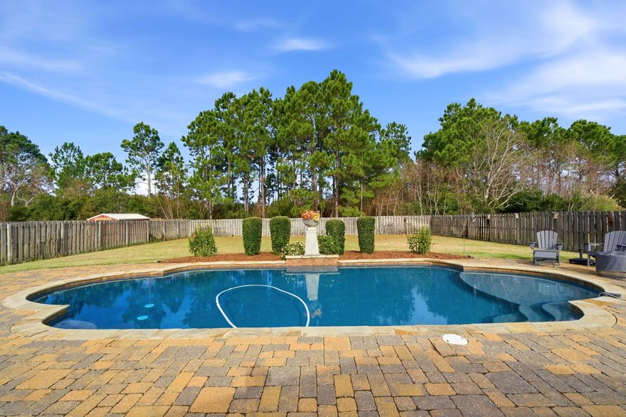 New Roof to be installed prior to closing. Welcome to 1635 Woodlawn Way, a stunning Gulf Breeze home offering luxury, comfort, and family-friendly living. The open, light-filled floor plan features spacious living areas and a well-appointed kitchen ideal for everyday living and entertaining.Enjoy your private backyard oasis with a luxury in-ground pool and large yard--perfect for family fun, outdoor dining, and hosting guests. Located on a quiet street just minutes from top-rated schools, shopping, dining, and Gulf Coast beaches. A rare opportunity to enjoy upscale living in one of Gulf Breeze's most desirable areas.