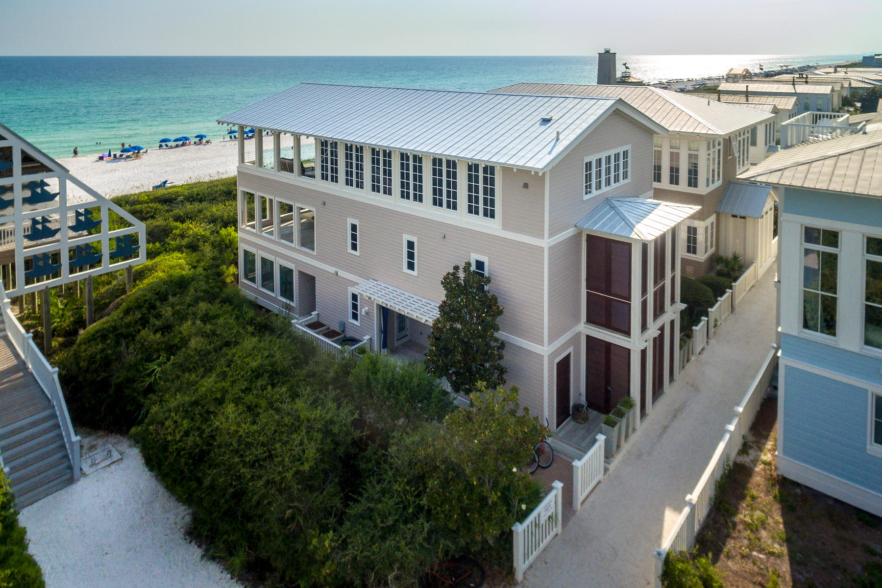 Custom one-of-a-kind and stunning do not come close to describing this Seaside Gulf front home that is truly ''Outside of the Box''. Located on the gulf in Seaside, where New Urbanism was founded, one can enjoy luxury while easily walking to Seaside town center. This beach home offers high-end luxury and has been appreciated by movie stars and prime ministers alike since 2003. Its luxury amenities, include gourmet kitchen, three 20'x 26' gulf front porches, glassed terrace for unobstructed views of the gulf, painted wood plank walls and elevator all define this four bedroom, six and half baths, three story architecturally-acclaimed home. Top of the line finishes include slate floors, stainless steel counter tops,