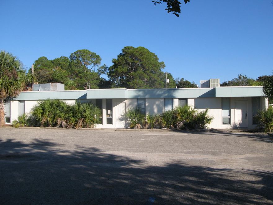 4 offices, large reception/waiting area, 1 restroom, storage room, coffee bar.