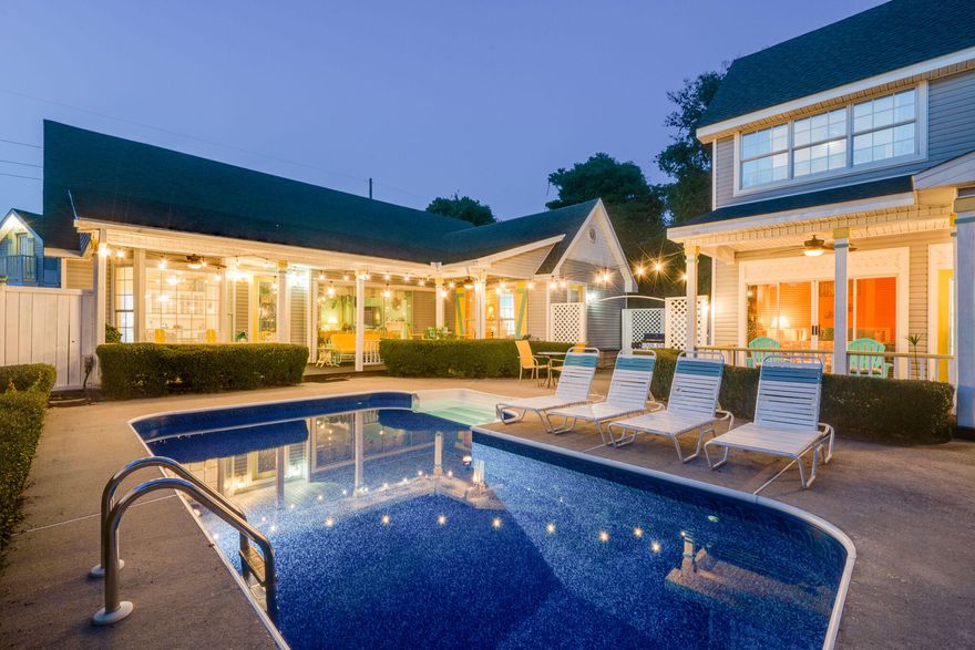 OWN THE MOST UNIQUE SET-UP IN CRYSTAL BEACH.  AN INVESTORS DREAM. 2019 Rentals $102,000.  2020-$101,358 not including cleaning, booking fee or taxes. With nearly $19,000 of cancellations due to the Covid shutdown, the rental figure for 2020 would be $122,908.The only lot with 2 ACTUAL houses on it along with a 280 sq ft loft above the 2 car garage which is ideal for the teens. The beautifully landscaped courtyard and heated pool separates the 1527 sq ft 2 Br/2 Ba main house from the 1000 sq ft 2 Br/1 1/2 Ba guest house. High ceilings and windows throughout add to the open fill. The 12ft sliding glass door of the main house opens to the large covered porch allowing the south wind breeze.The lot, which is 80' x 150' and one of the largest in Crystal Beach allows for plenty of privacy.