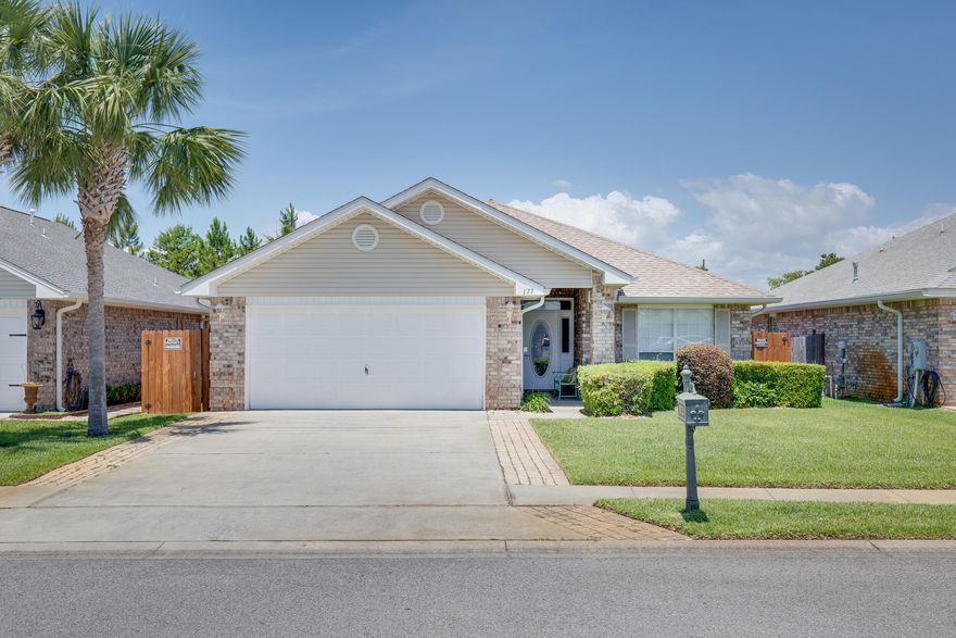Wonderful 4BR/2BA home within the gated community of Paradise Retreat.  Spacious dream kitchen has an eat in dining area, breakfast bar & stainless steel appliances.  Additional upgrades include new HVAC, large/angled tile throughout, guinite heated pool and new 8X10 pool deck and brick pavers. Home is also equipped with hurricane protectors for windows, doors & garage.  Furnished with a few exceptions, this Vacation Home sleeps 11 and boasts of an expansive master bedroom ensuite with walk in closet,  double vanity, jetted tub, separate shower plus 3 additional bedrooms.  Enjoy your lovely outdoor living space with private backyard & heated pool or take a short walk to your deeded beach access.  Conveniently located to shops & dining at The Commons and Silver Sands Factory Outlet.