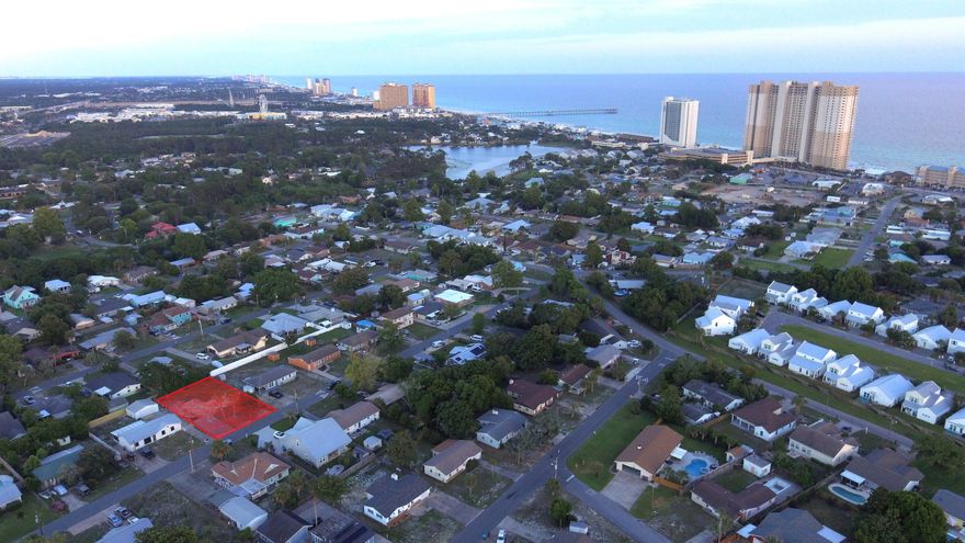 Discover the perfect canvas for your dream beach home on this cleared and level 72 x 110 lot, ideally located just four blocks from the white sandy shores of Panama City Beach. Nestled in the well-established El Centro Beach neighborhood, this homesite is within walking distance to beach access, popular dining spots, and local attractions, offering the ultimate coastal lifestyle. Positioned just west of Pier Park and south of Highway 98, the lot is ideal for a serene primary residence or vacation getaway. Enjoy the convenience of city sewer, public water, and underground utilities, with previous utility connections in place from a former residence. This golf cart-friendly community features no HOA fees, allowing you the freedom to create your own private oasis. Don't miss the opportunity to own a piece of prime real estate in the heart of Panama City Beach.