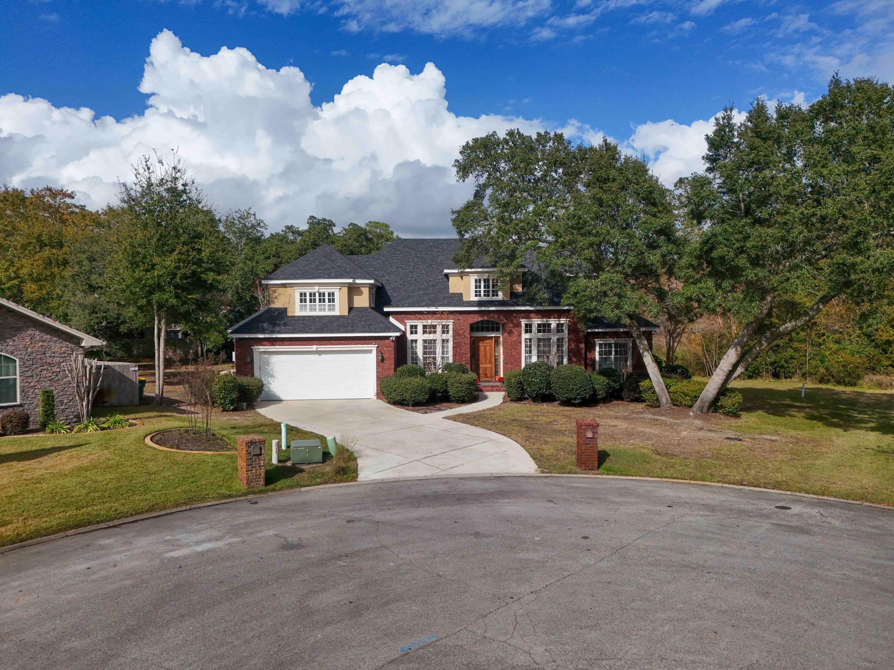 Rare find!  Beautiful 6B/4B home in the heart of Niceville, situated in the cul-de-sac of picturesque waterfront Lanman Road.  NEW ROOF, whole-house generator, 2 tankless hot water heaters and 2 HVAC zones. This 2-story executive residence features a spacious primary suite plus two guest bedrooms and a full guest bath on the main floor. The Great Room features floor to ceiling built-ins, high ceilings and shares an open view to the gourmet kitchen, dining and bonus room with fireplace.  French doors lead to the covered patio. Upstairs is an open landing plus three additional bedrooms (two quite large with special features), two full baths and access to a covered porch perfect for enjoying sonshine or rainy days. If space is what you need and style is what you want, 3 Lanman is waiting!