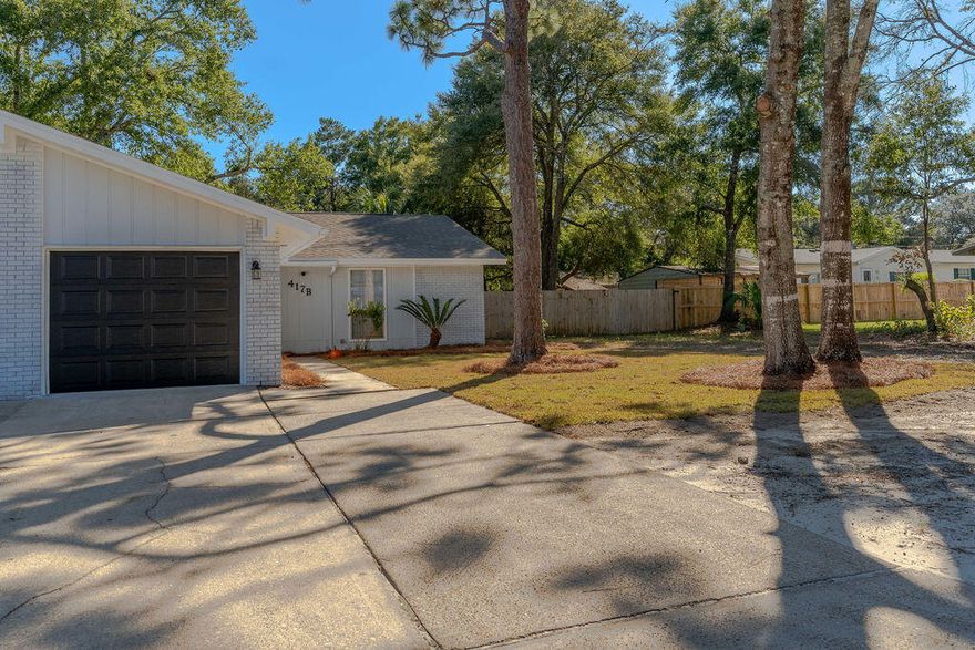 This is a rare find in Fort Walton Beach.  A single story unit with three bedrooms, two full baths and an attached one car garage. The yard is spacious in the front and back and grants plenty of privacy from the neighboring lot. Fully renovated kitchen with new cabinets, granite counter tops, new stainless steel appliances, LVP flooring, freshly painted inside and out, new bathroom vanities and fixtures. Roof was replaced in 2015 and plumbing was replaced 2023. The HVAC unit has been recently serviced and the hot water heater is 2021.
