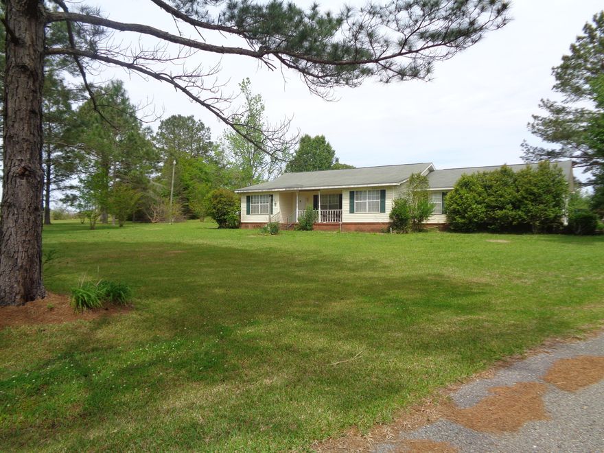 GREAT CUSTOM BUILT 3 BEDROOM 2 BATH HOME LOCATED IN THE HACODA COMMUNITY. HOME SITS ON 2.5 ACRES WITH 2 SMALL PONDS ON THE PROPERTY. HOME OFFERS A LARGE OPEN LIVING AND FORMAL DINING, SEPERATE SITTING ROOM THAT COULD BE A 4TH BEDROOM IF NEEDED. HOME HAS ALL CUSTOM CABINETS, APPLIANCES, AND A EAT IN KITCHEN AREA AS WELL AS LARGE PANTRY. HOME HAS BEEN WELL CARED FOR AND HAS NO WASTED SPACE IN THIS FLOOR PLAN. ATTACHED TO HOME IS A 1 CAR GARAGE ALONG WITH A HOME OFFICE. THE HOME HAS A ATTACHED SCREENED BACK PORCH, LARGE COVERED FRONT PORCH, STORAGE BUILDING AND AN AMAZING YARD! CALL TO SEE THIS!