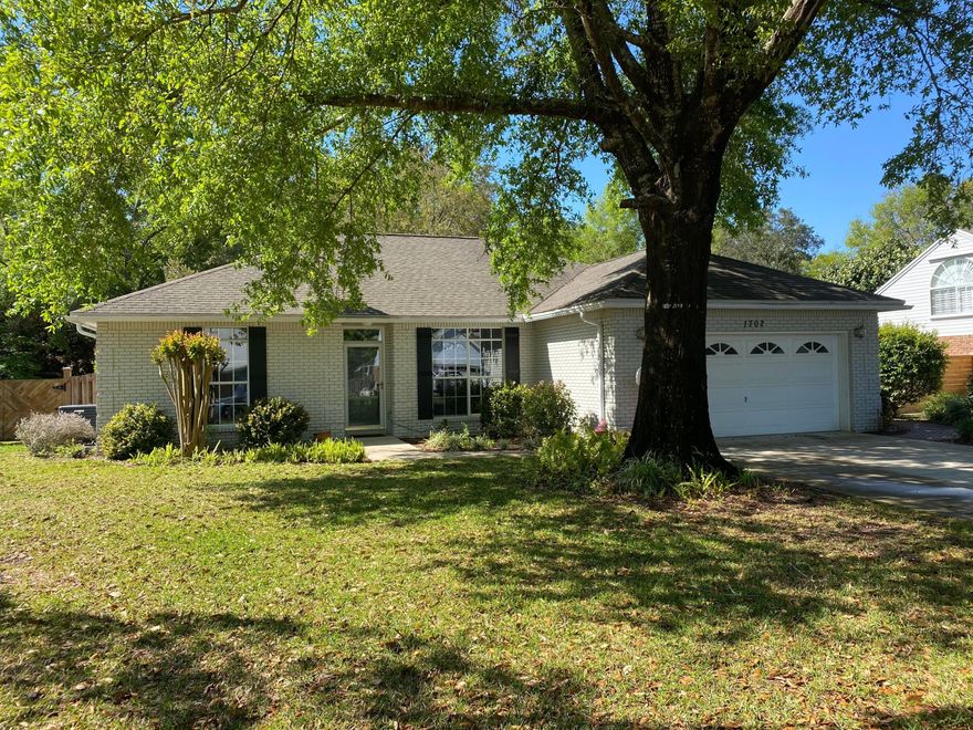 This beautifully renovated 3 bedroom 2 bath home is located in a cul-de-sac on a .26 acre lot backing up to the reservation.  Featuring a nice open floor plan this home has it all and is perfect for family gatherings and entertaining.  The family room and dining room are both open to the kitchen.  Home has beautiful flooring throughout with no carpet!  Updated kitchen with gas stove, granite countertops, center island and stainless steel appliances.  Split bedroom floor plan with Master on one side and 2 additional bedrooms on the other.  Master bedroom has a walk-in closet, and Master bath features dual vanity sinks, granite countertops and a beautiful walk-in shower.  The guest bath also has granite countertops.  Roof 2005, HVAC 2020 & water heater 2010.  Termite bond in place.