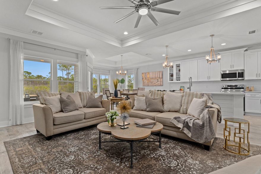 Welcome to Laguna Haven, Panama City Beach's newest 40 home gated community. Laguna Haven is conveniently located at the scenic and quieter West end of Panama City Beach - away from traffic and congestion. The Florence floor plan features 4 bedrooms, 2 full baths. Exterior features are cement hardie backer board siding, paved driveway and lush landscaping. ''Tie-max'' system is used to utilize long threaded rods and truss clips to tie the roof to the concrete slab. Step inside the home to find wood-look porcelain tile, soaring 9-10 ft ceilings, crown molding, bull-nose corers for those extra touches of elegance & a designer lighting package. Short term rentals allowed.