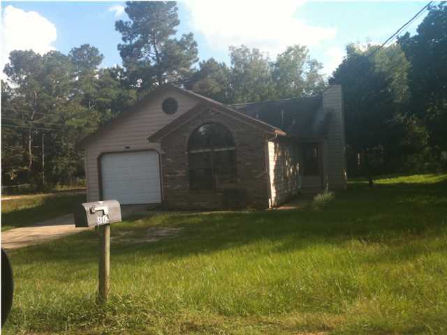 CUTE LITTLE HOUSE, WHOLE HOUSE WAS PAINTED 4 MONTHS AGO, LIVING ROOM FEATURES FIREPLACE AND SKYLIGHT, KITCHEN & DINING ROOM WHICH VIEW TO THE BACK DECK. SPLIT FLOOR PLAN, MASTER BATHROOM HAS WALK IN SHOWER AND SIGNLE VANITY SINK, HALL BATHROOM HAS BATH TUBAND SINGLE VANITY SINK, 1 CAR GARAGE WITH AUTO GARAGE DOOR OPENER PLUS WASHER AND DRYER HOOK UP . HOUSE SITS ON LARGE CORNER LOT.