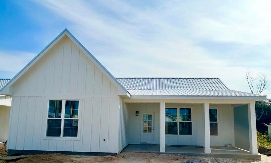 Introducing a brand new coastal build home on 16th Street in Panama City Beach. Just a short walk to the sugar white sand and emerald waters. This 3 bedroom, 2.5 bath home is designed with elevated finishes throughout, including custom cabinetry, quartz kitchen countertops, and 9 foot ceilings that create a bright, open feel. Outside, enjoy your own private 10x20 pool, a paver driveway, and a paver pool deck for low-maintenance coastal living. With quality craftsmanship and an unbeatable location, this home is perfect as a primary residence, vacation retreat, or investment property.