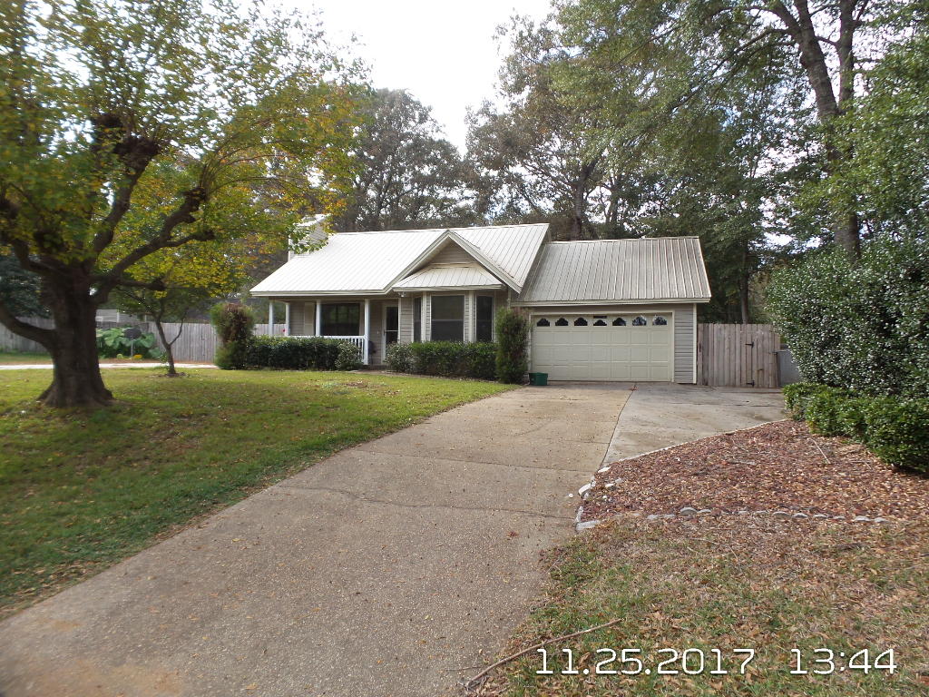 Available NOW!!!!!.......Cute Florida Cottage home in north Crestview. Easy commute to bases, beaches & shopping. 2/1 Floor plan features wood burning fireplace, ceramic tile floors, spacious living room, dining room and large kitchen. Sliding glass door exits to the covered back patio area with expansive back yard and mature landscaping. Large front yard features RV parking, 1 car garage, additional driveway for trailer parking, multi-vehicle parking and so much more. No inside smoking. Pets will be allowed with owner approval and $400 non-refundable pet fee.